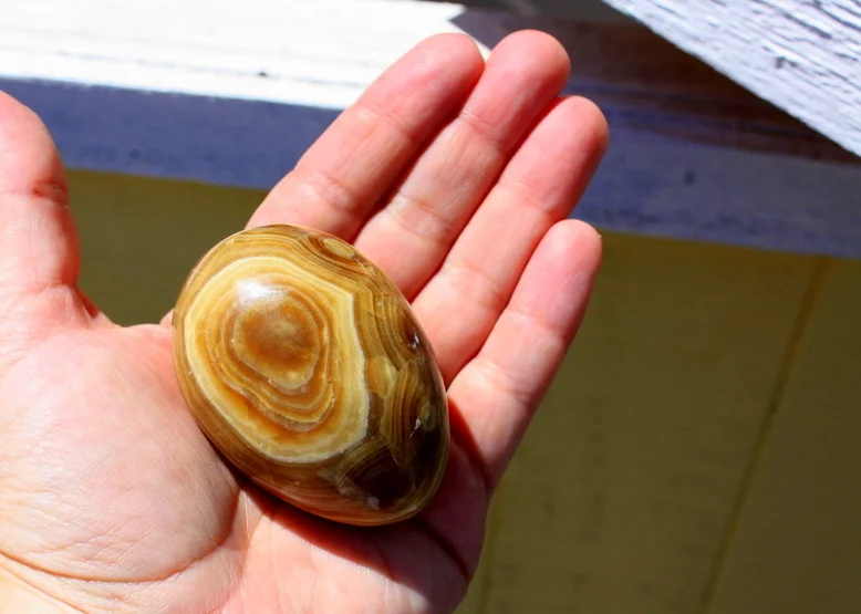  We learned that faux eggs are often used in nest boxes to help encourage laying there. Most farmers just use platic eggs, but Red Star likes to keep it fancy with marble. 