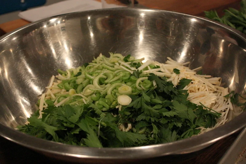  Ready to toss the salad in one of The Pantry's giant bowls. Diane noted she loves having this kind of huge bowl for entertaining, and she uses disposable kitchen gloves to toss the salad by hand to get the best, most even dressing. 