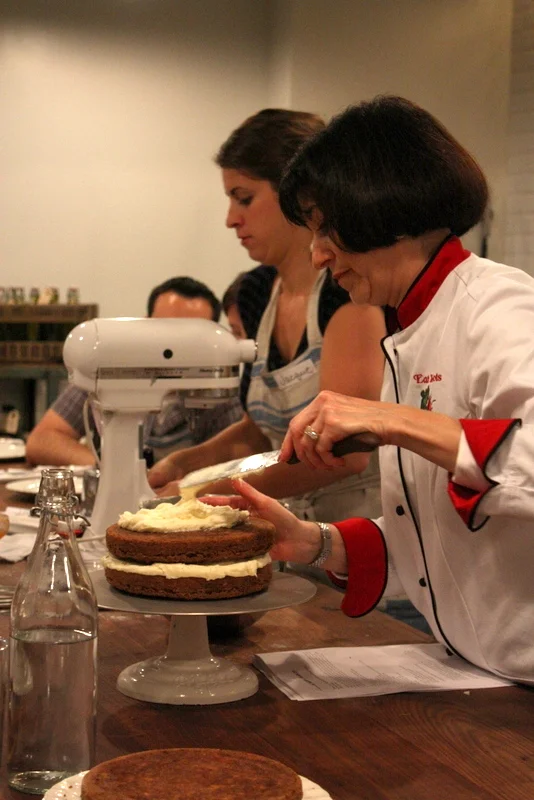  Diane icing the cake. 