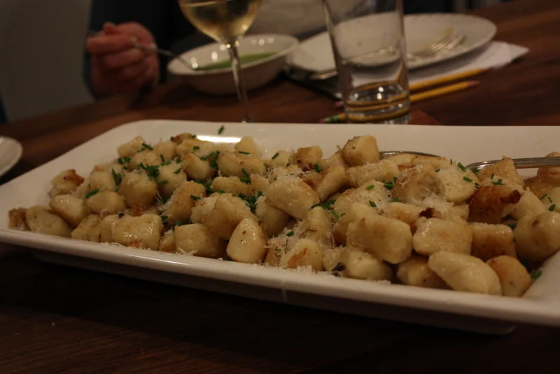  Finished gnocchi - after being boiled, they were sauteed and topped with parmesan and chives. 