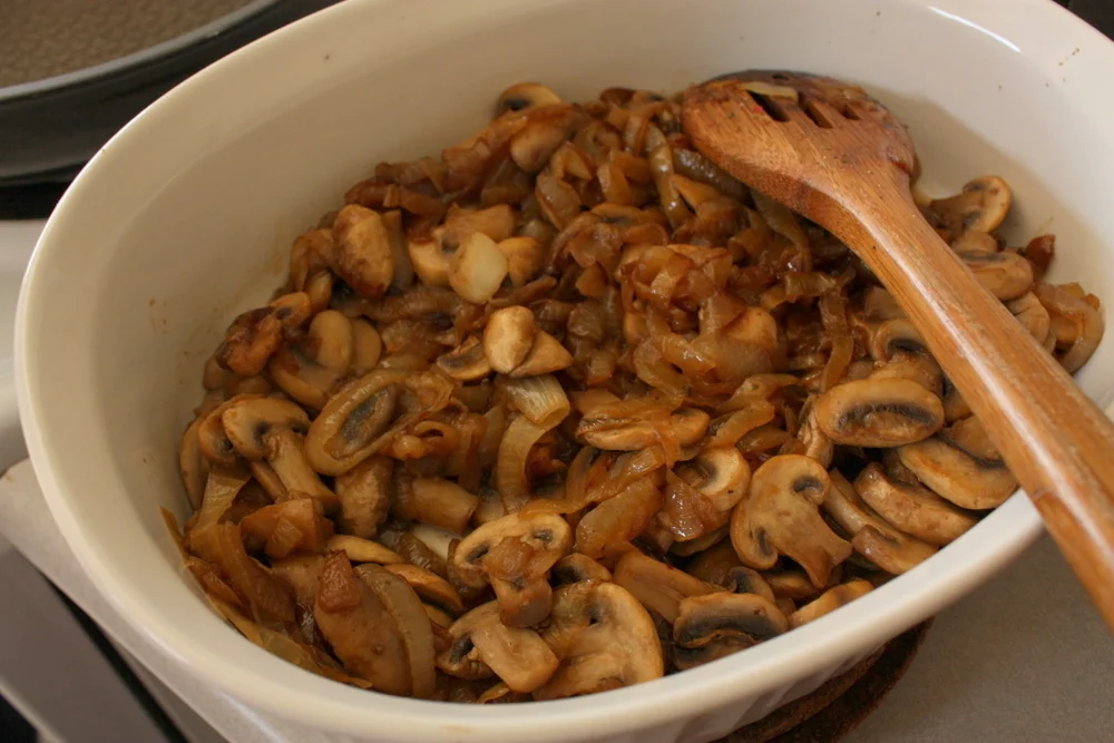  The first thing she made was a large savory pie, filled with mushrooms and onions. 