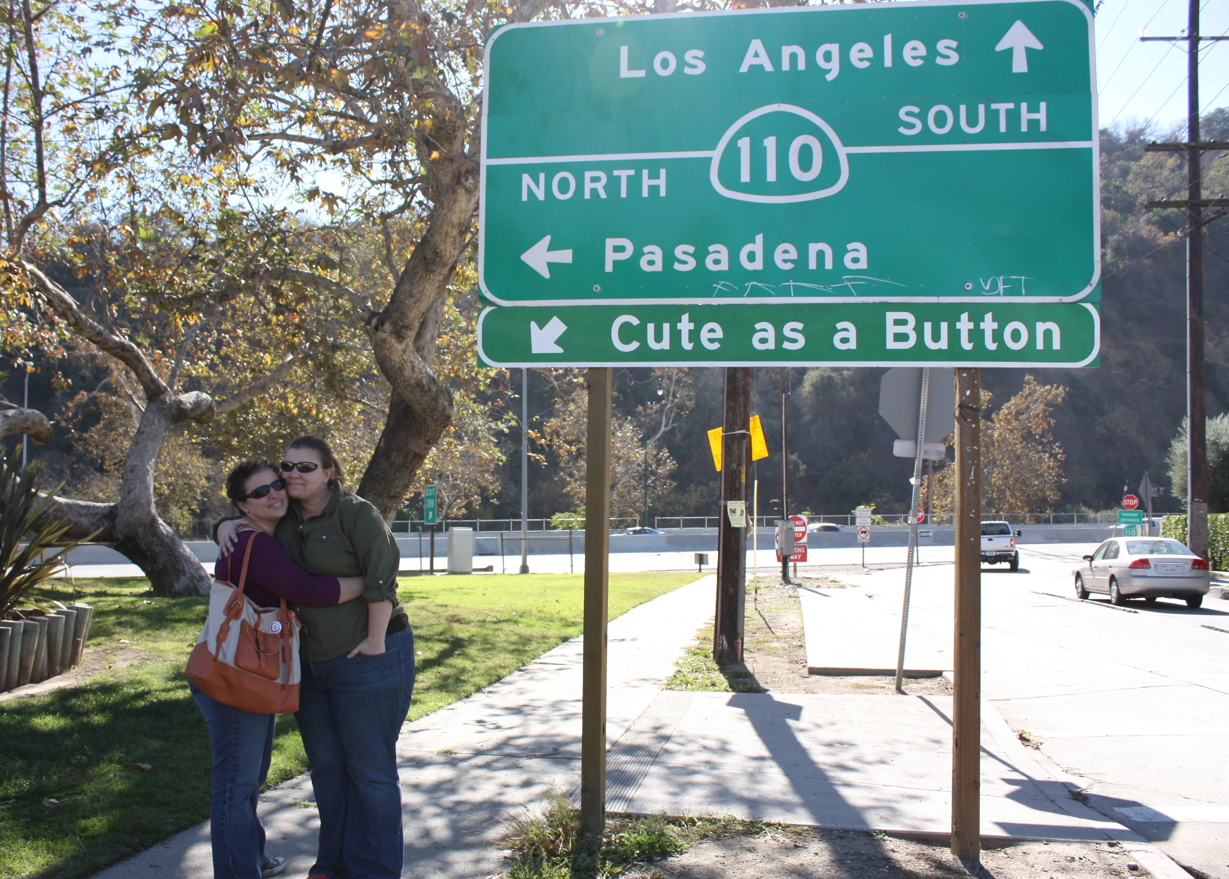  My friends Jen and Angie had found this sign installation and I got a picture of the two of them before it was removed. 