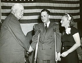   President Herbert Hoover meets an ICD client, flanked by Margaret Milbank Bogert, daughter of the founder, in 1949.  