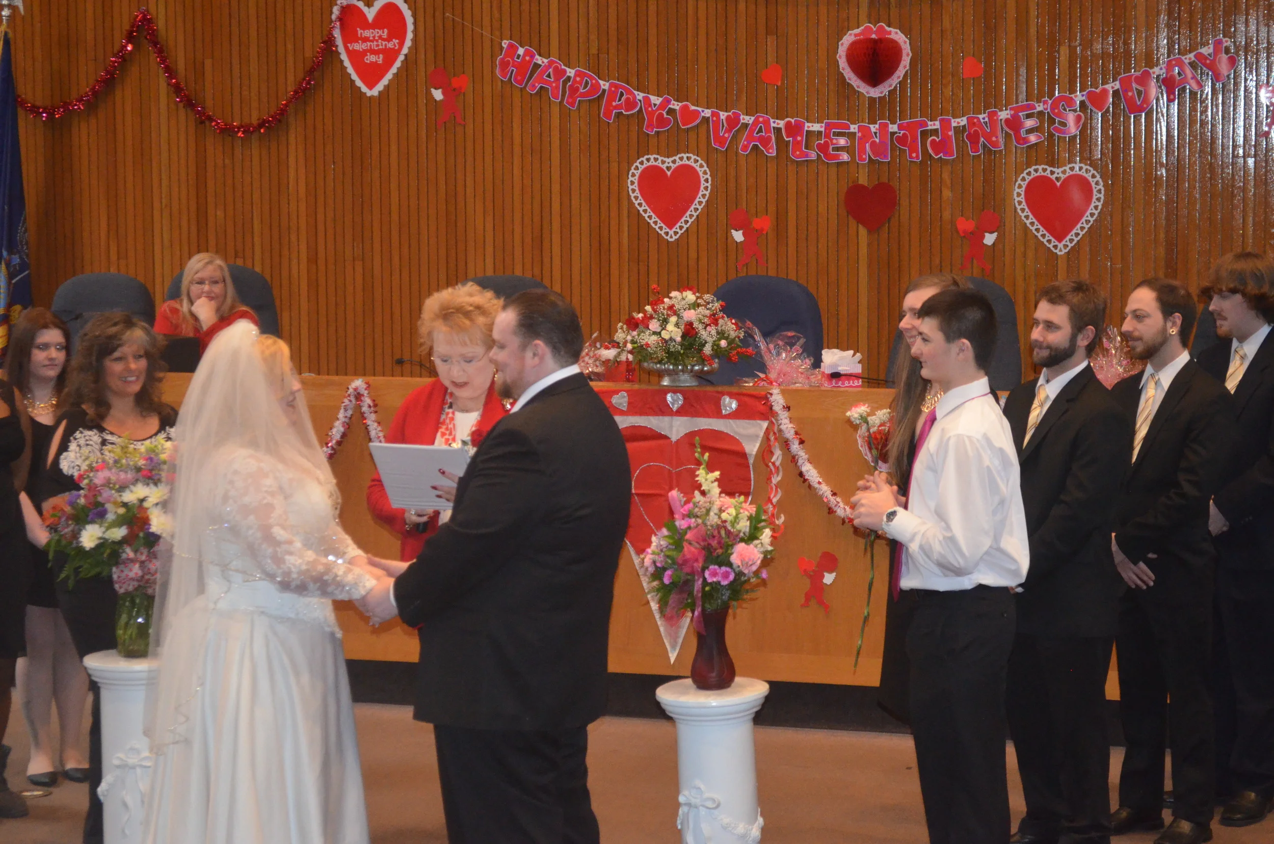 Lovebirds Flock To Town Hall For Wedding-Thon