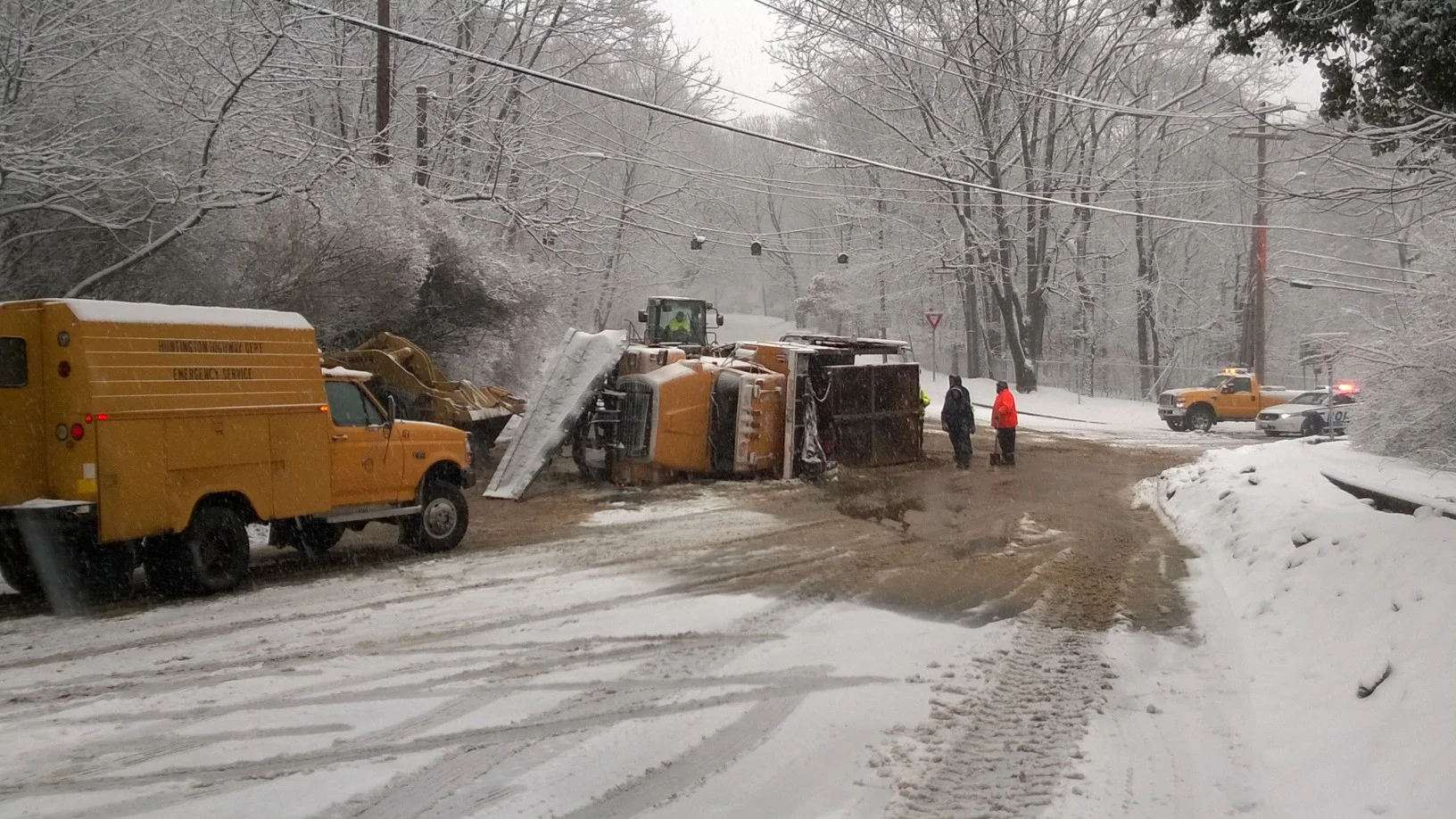 Snow Plow Topples