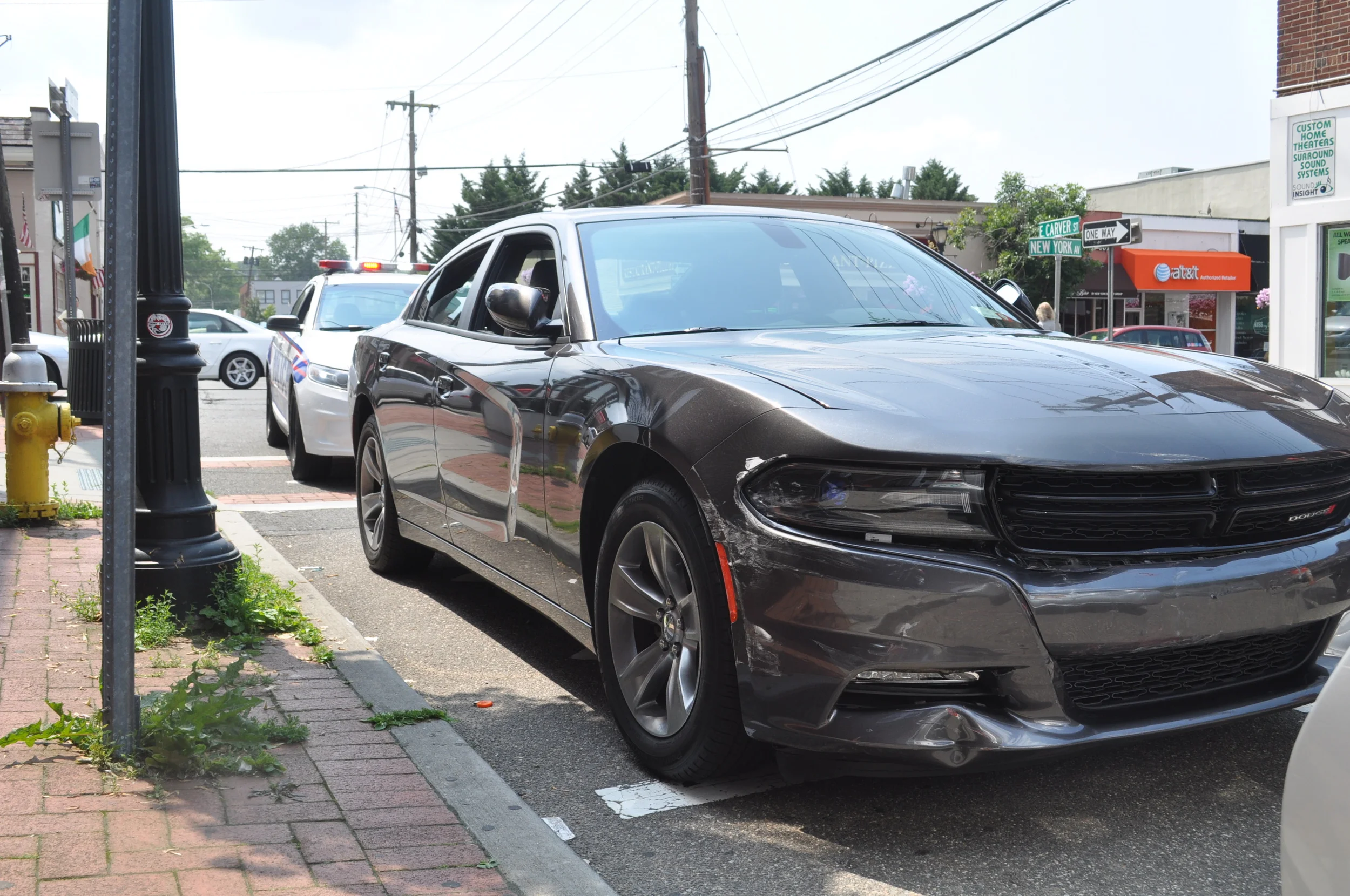 Witnesses: Woman Barrels Through Huntington, Hits Cars