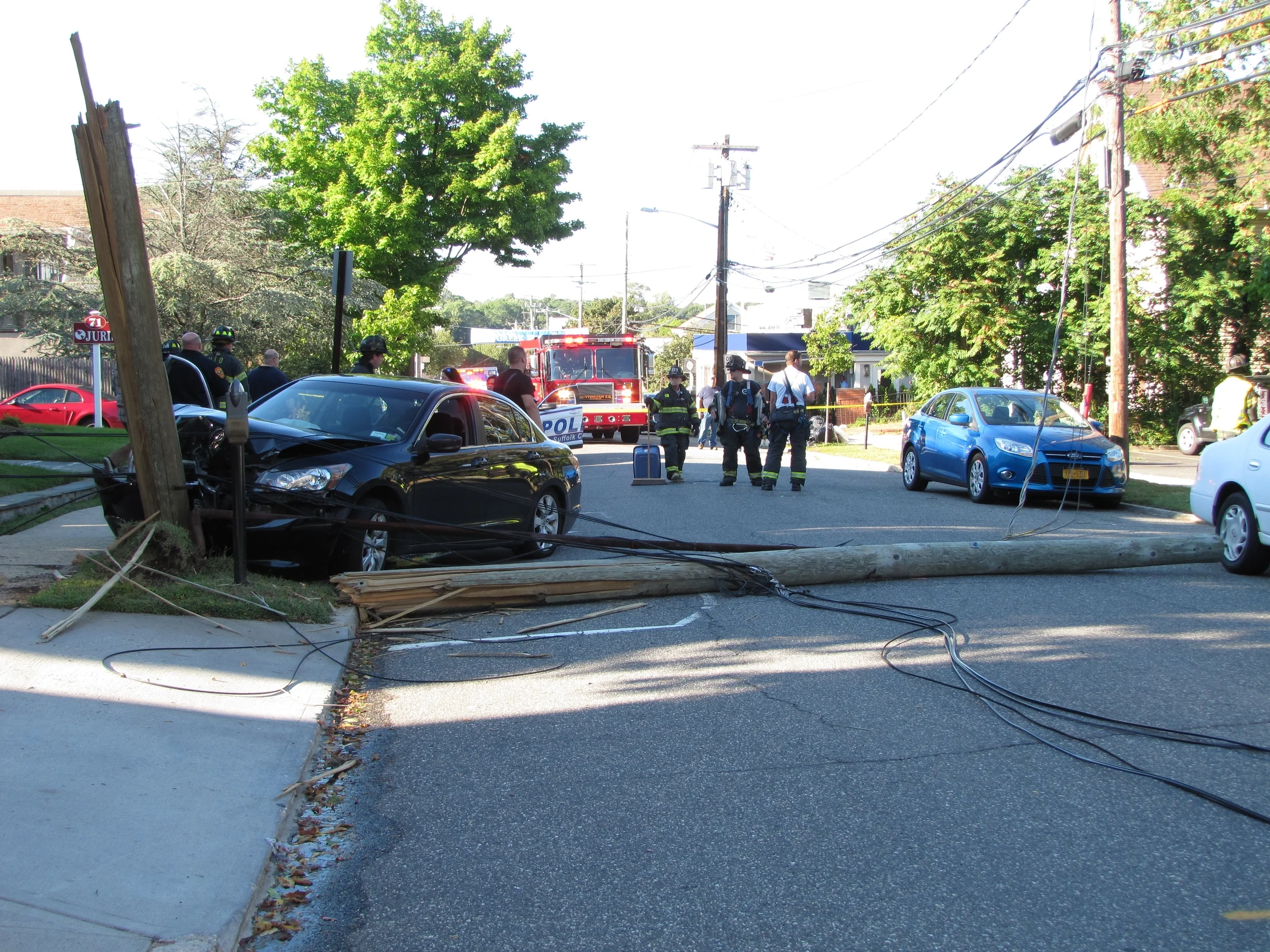 Car Splits Utility Pole In Half