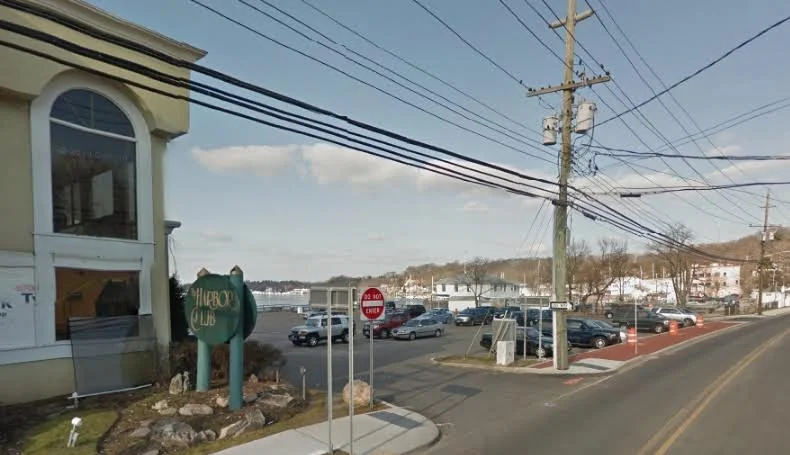 Harbor Club Pays For Town Parking Lot Repair
