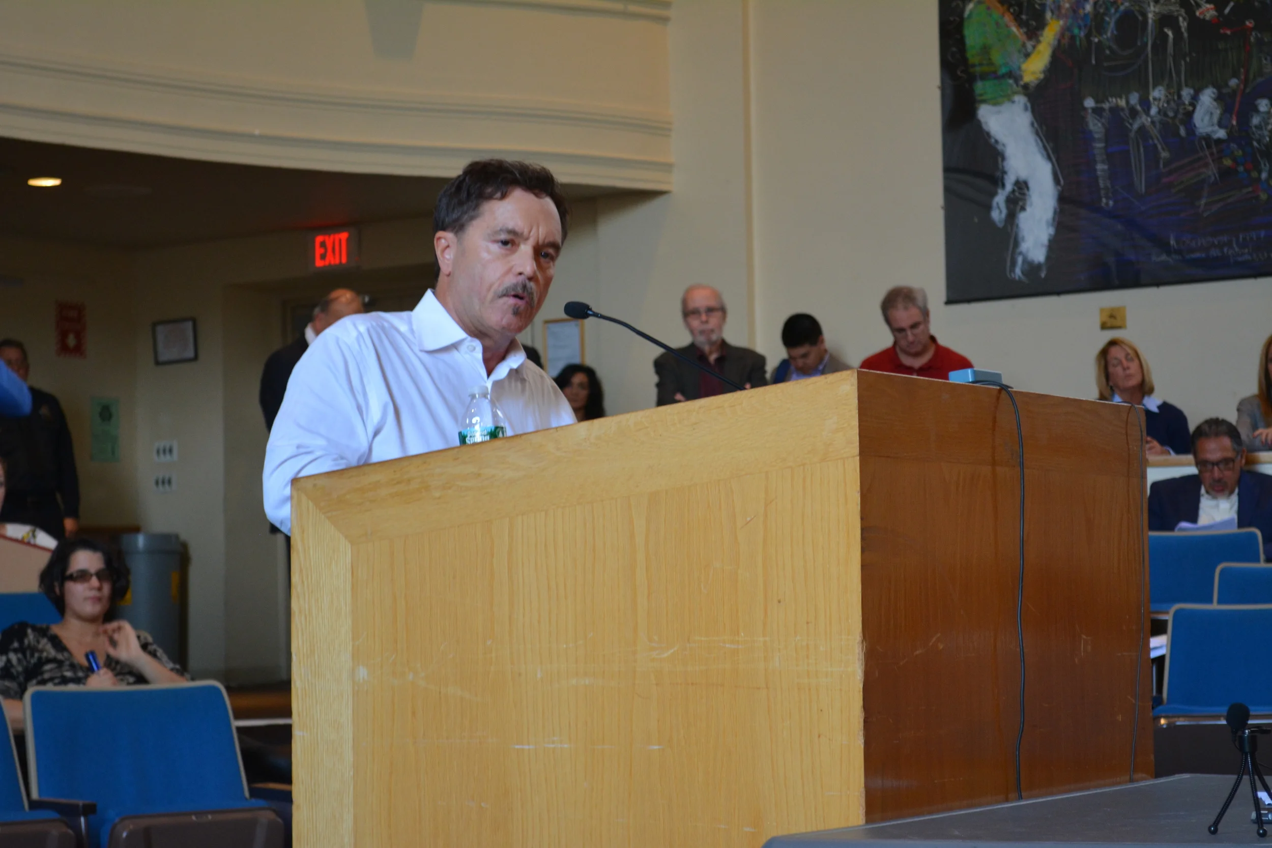 Robert Holmes, of Asharoken, speaks during the Nov. 6 Huntington town board meeting against a proposal calling for an oversized dock planned to extend off of a 22-acre Duck Island property in Asharoken. The proposal was approved by the board 4-0.