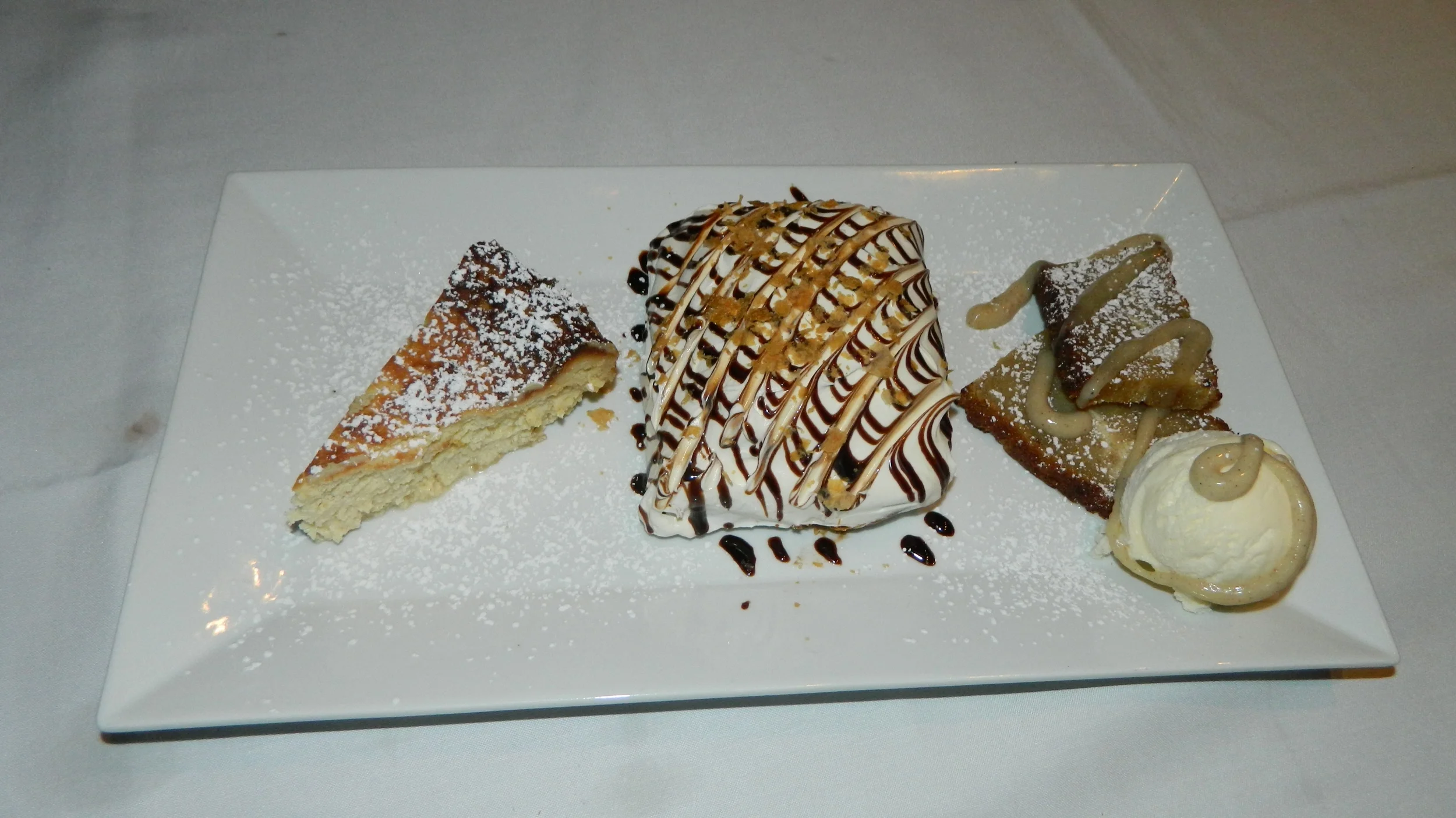 Italian cheesecake, Napoleon and banana bred pudding with vanilla ice cream.