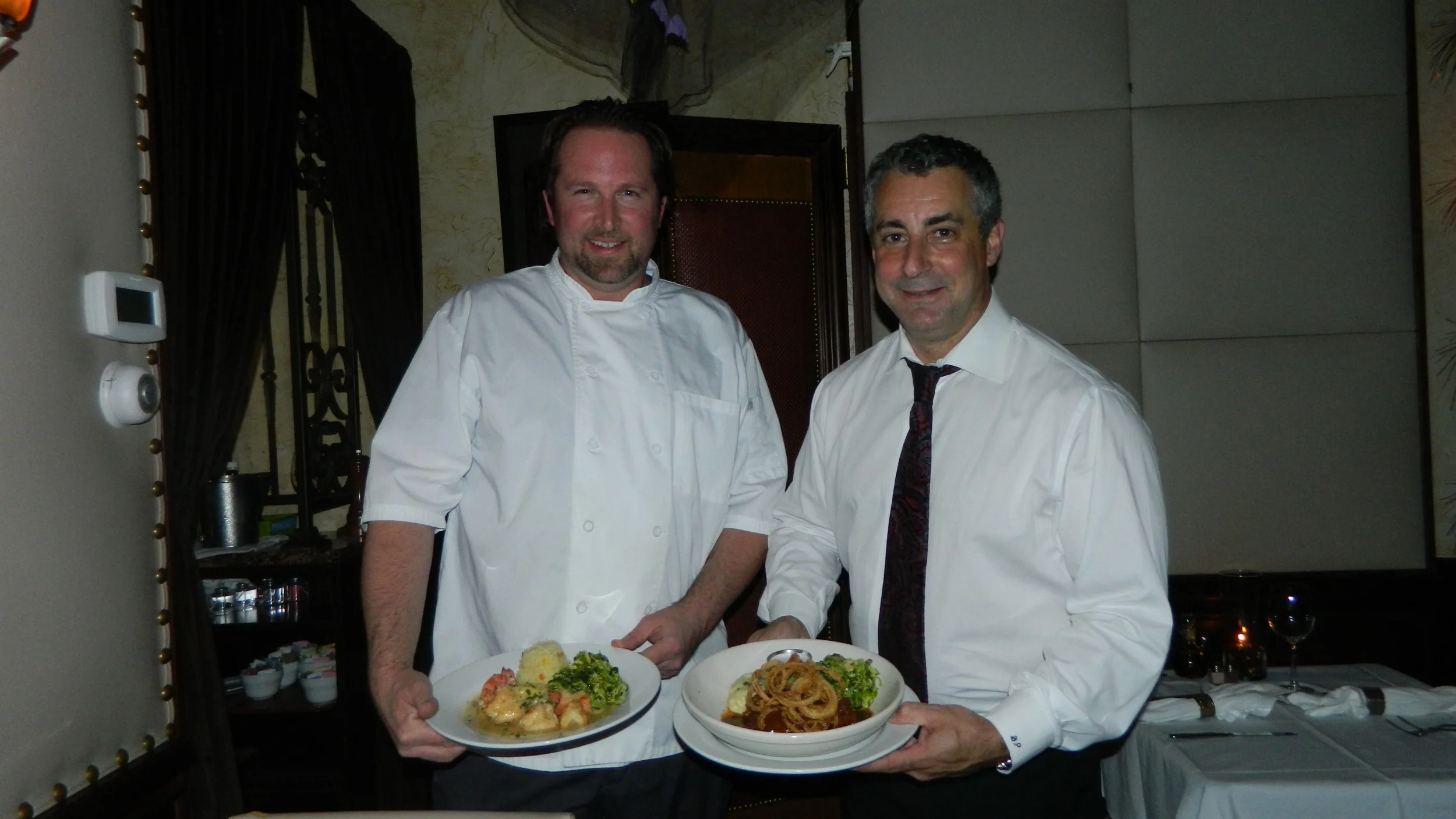 Chef Andrew Crabtree and owner Dean Philippis of Piccolo Restaurant in Huntington present shrimp scampi and braised boneless beef short ribs.