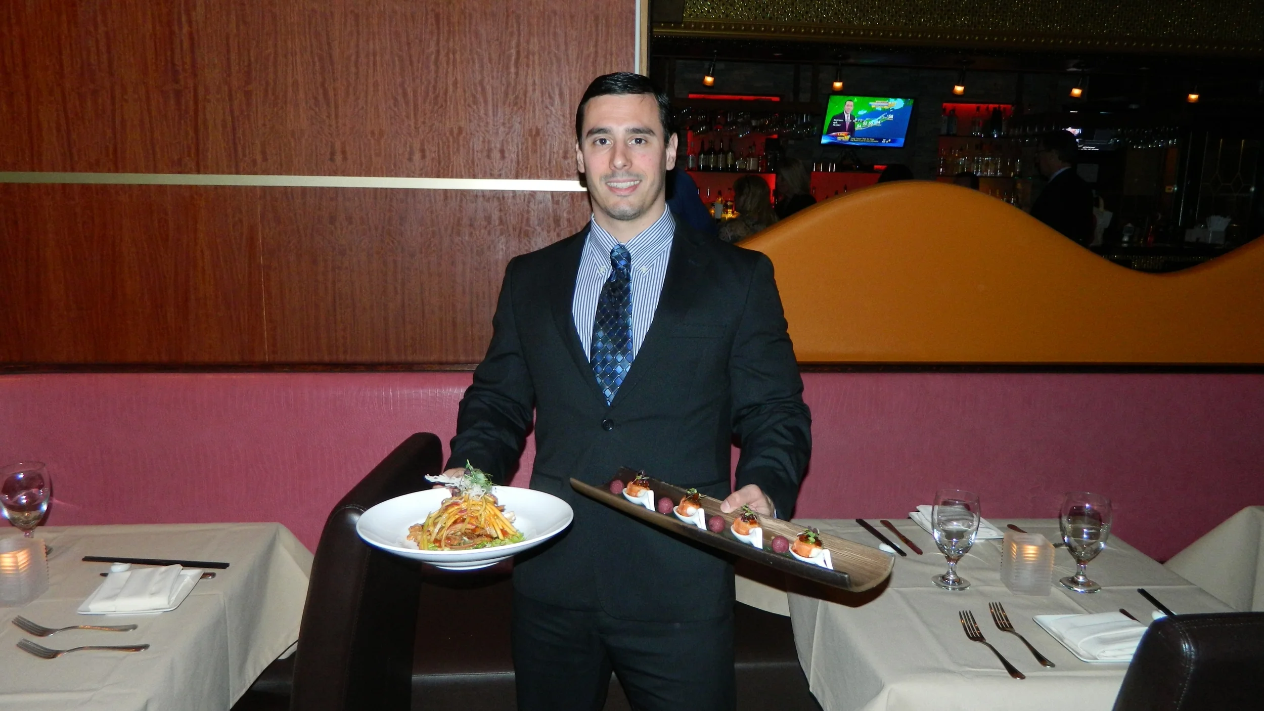 Ting Manager Colin McGlone presents salmon shooters and soft shell crab.