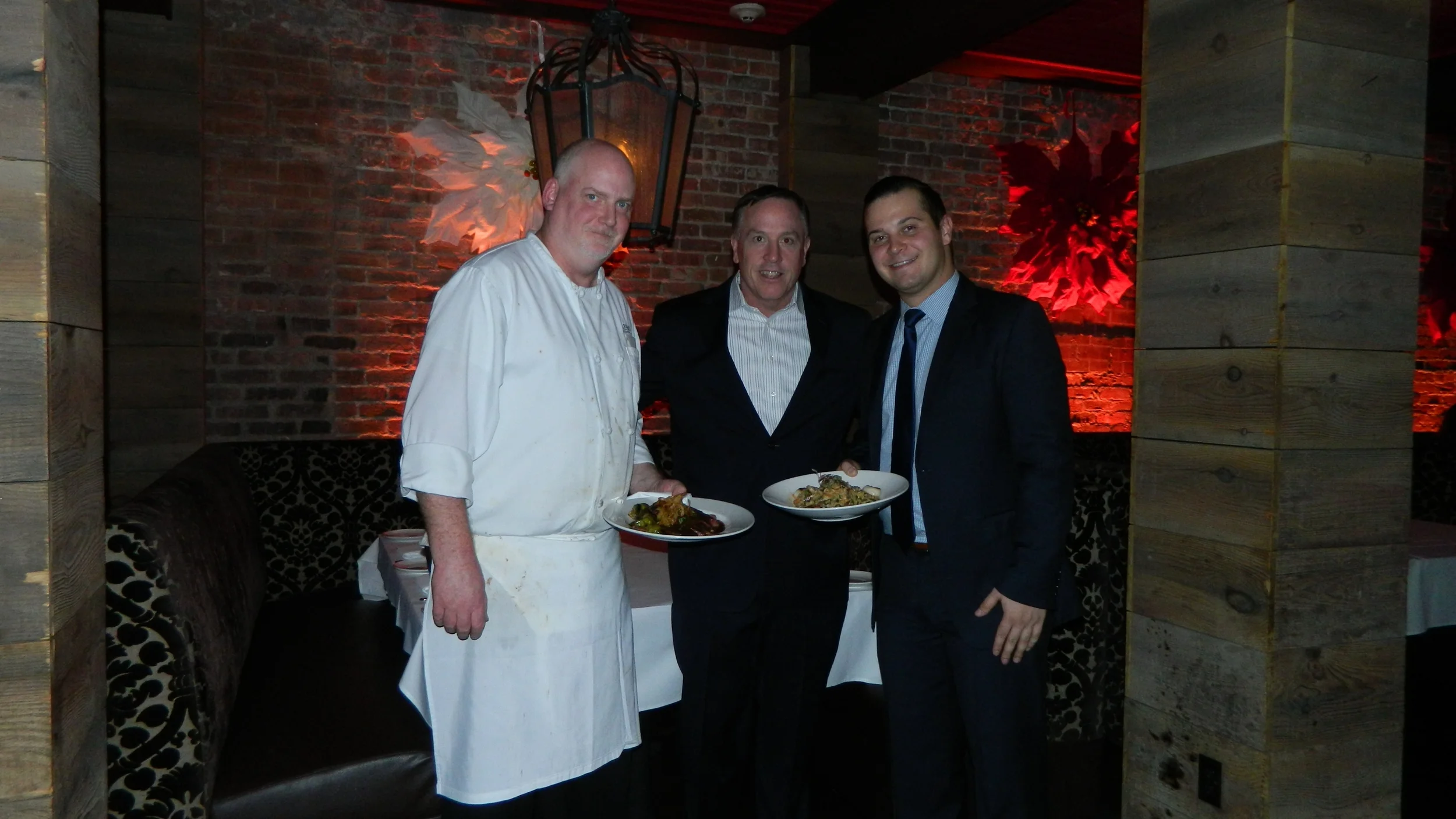 Honu chef Robert Flaherty, owner Mark Zecher and manager Tom Nocella present skirt steak and shrimp and sea scallop risotto dishes.