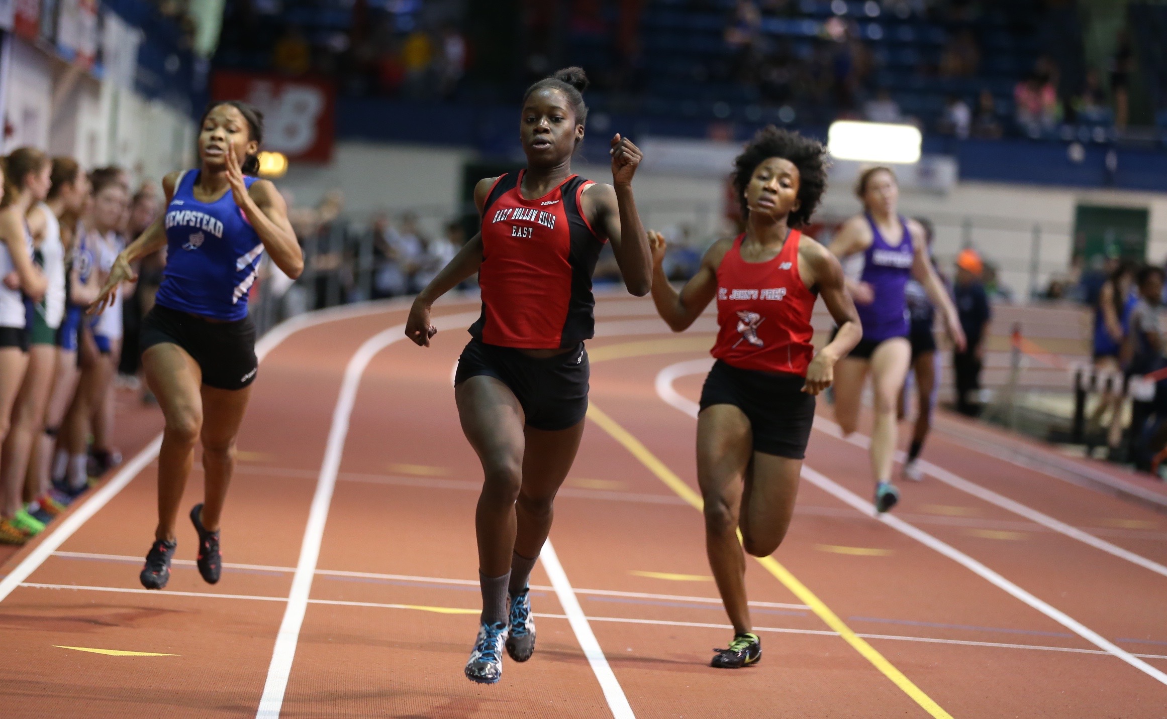 Mary Chimezie, a High School East senior, races the 300-meter at the Molloy Stanner Games in Manhattan earlier this month. She finished in 39.49 seconds, which is the fifth-fastest time in the country this winter season.