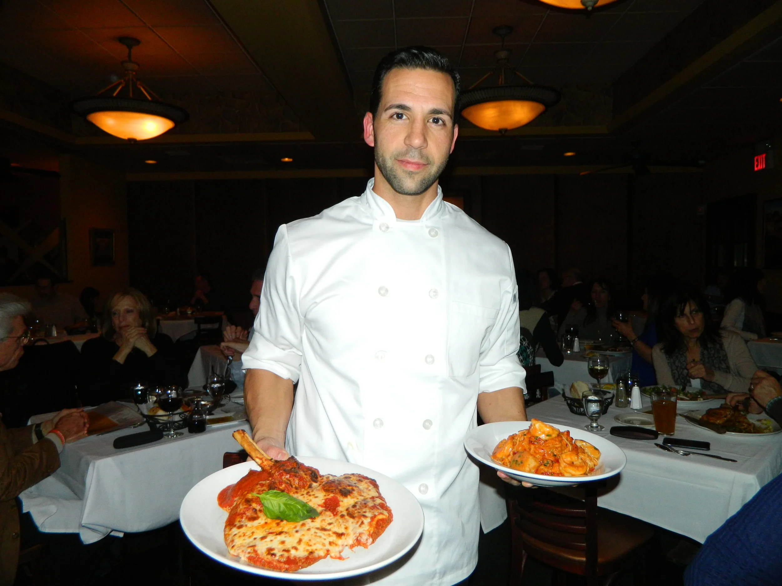 Cirella’s Executive Chef Anthony Trobiano presents eggplant parmigiana and Capellini Pescatore entrees.