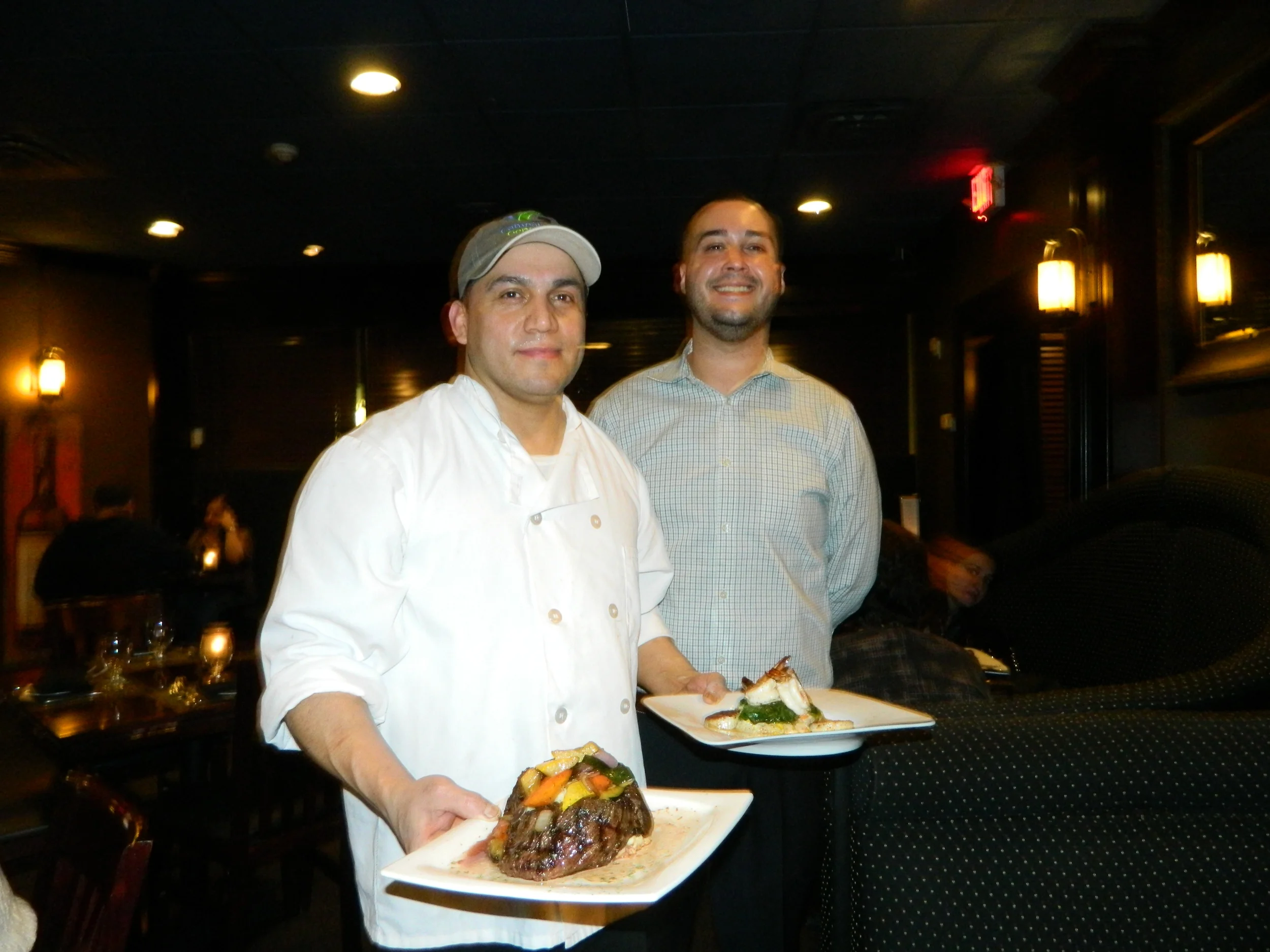 Black & Blue Chef David Guzman and General Manager Rocco Furgiuele present the 16 oz skirt steak and Sauteed Shrimp and Scallops.