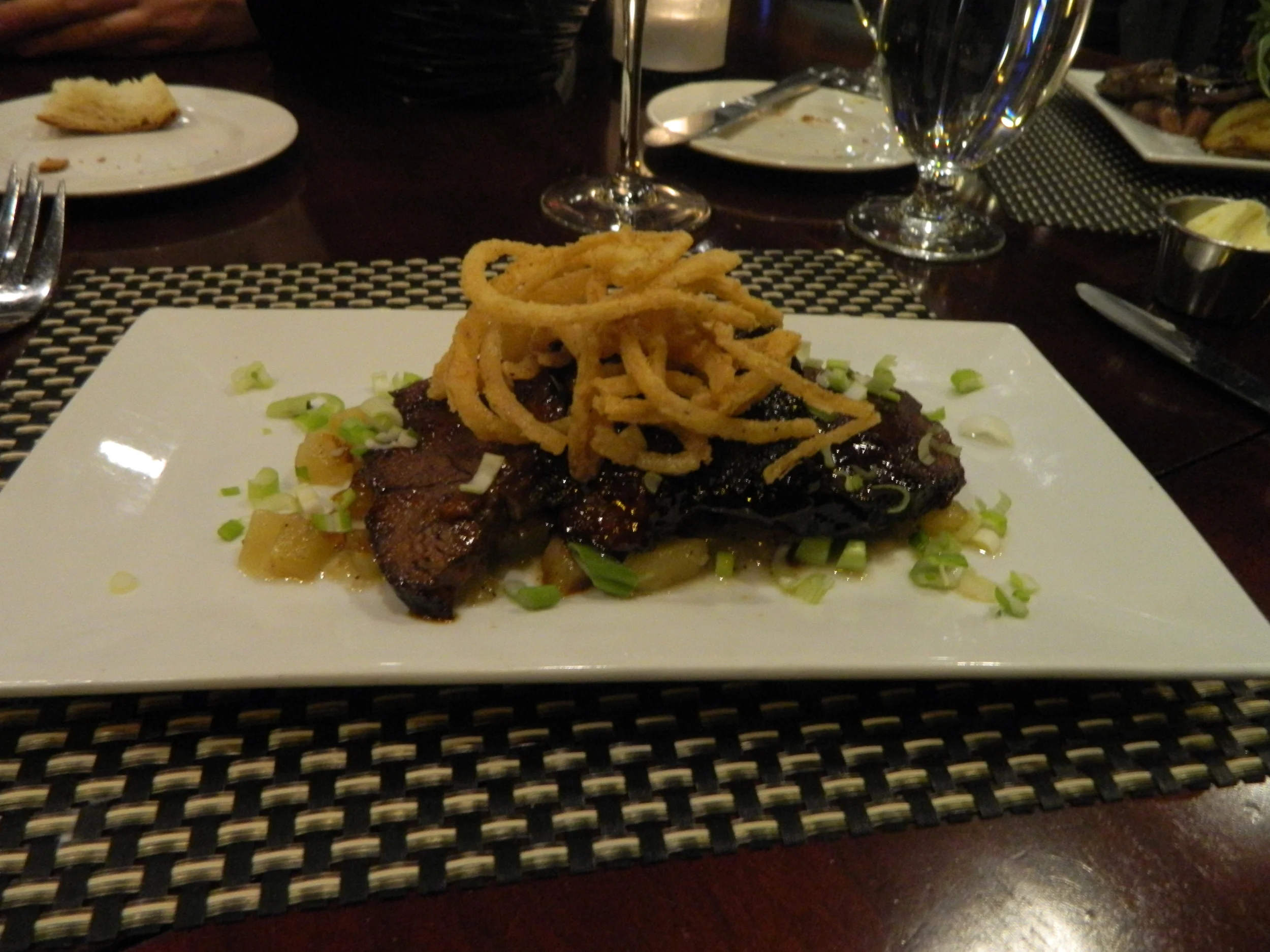 The Asian lacquered short ribs at Black & Blue are perfectly marinated and fall off the bone.