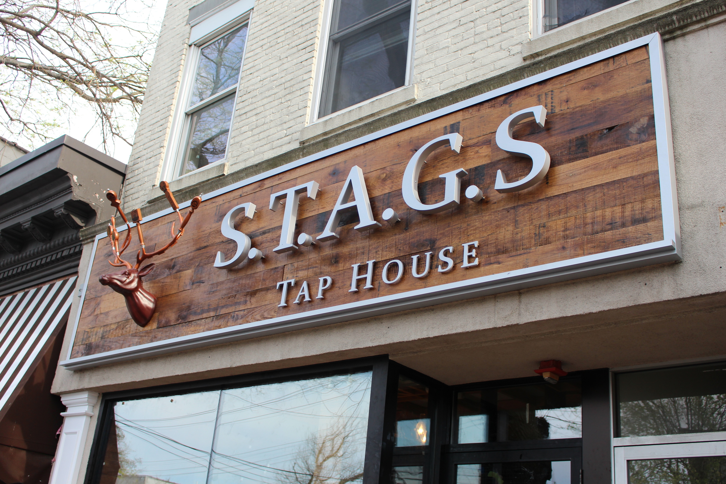The newly-installed marquee above soon-to-be-open S.T.A.G.S. Tap House in Huntington village was custom-made by Huntington Station-based Signarama.
