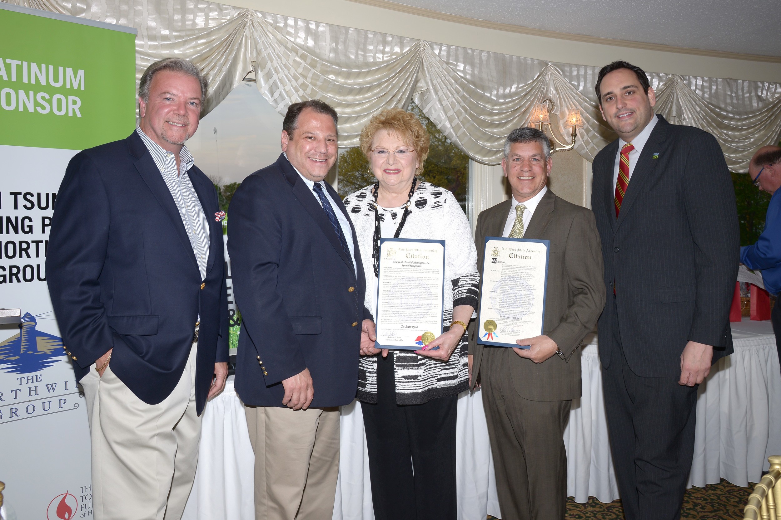 From left: Jim Powers, president of the Townwide Fund of Huntington; state Assemblyman Andrew Raia; Huntington Town Clerk Jo-Ann Raia; Jim Tsunis, golf outing honoree, and managing member of the Northwind Group; state Assemblyman Chad Lupinacci (R-Huntington Station) gather at the dinner following the annual charity golf outing. Photo by Pam Setchell/Viewpoint