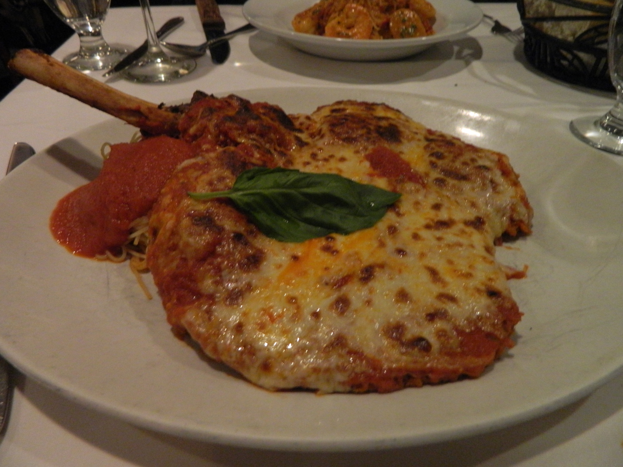The Costoletta Di Vitello Alla Parmigiana (pounded veal chop) is available on the lunch menu at Cirella’s in Melville. 
