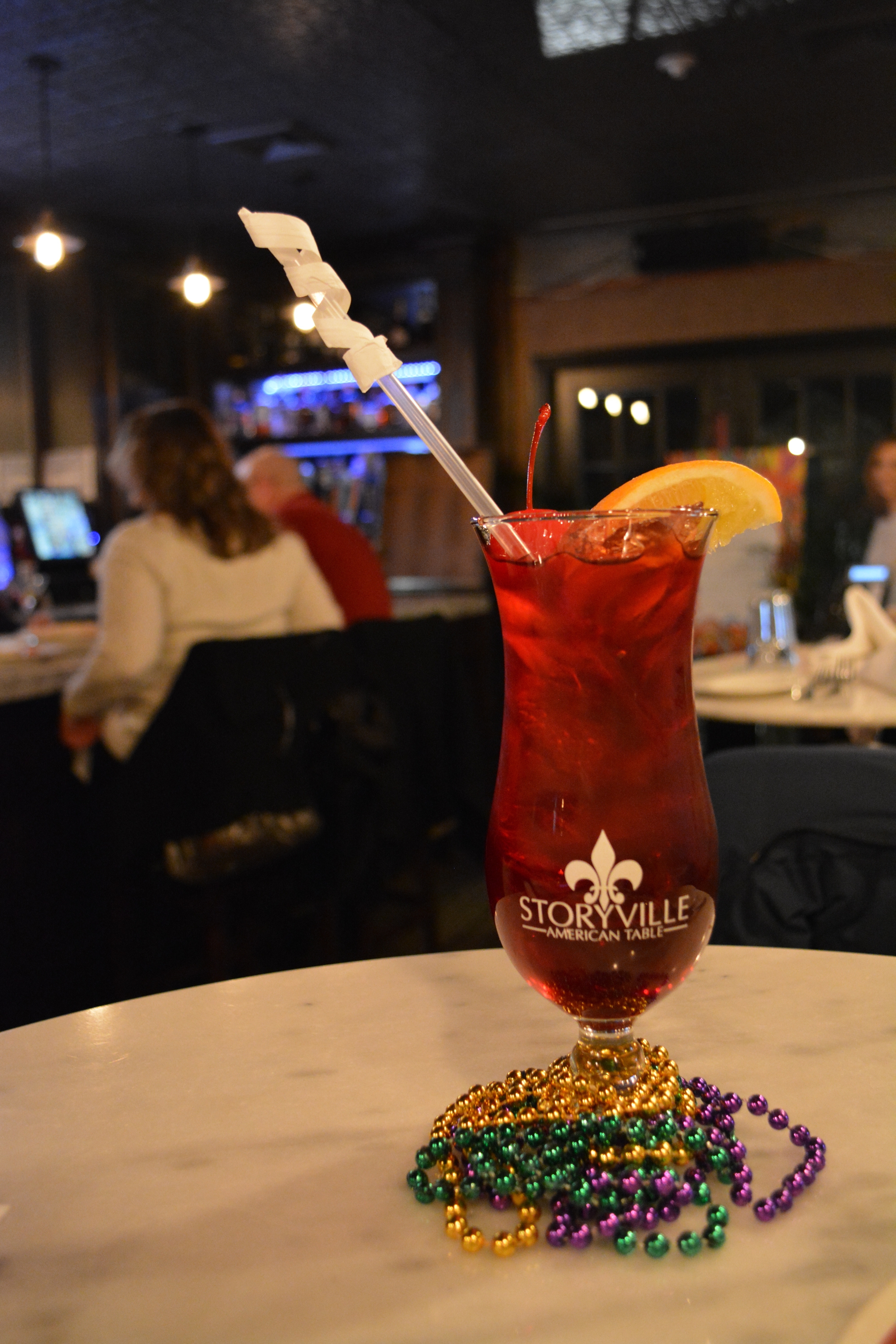 Big, bold and world-famous, The Hurricane cocktail at Storyville American Table is packed with dark rum, Pat O'Brien's Hurricane Cocktail Mix and crushed ice.