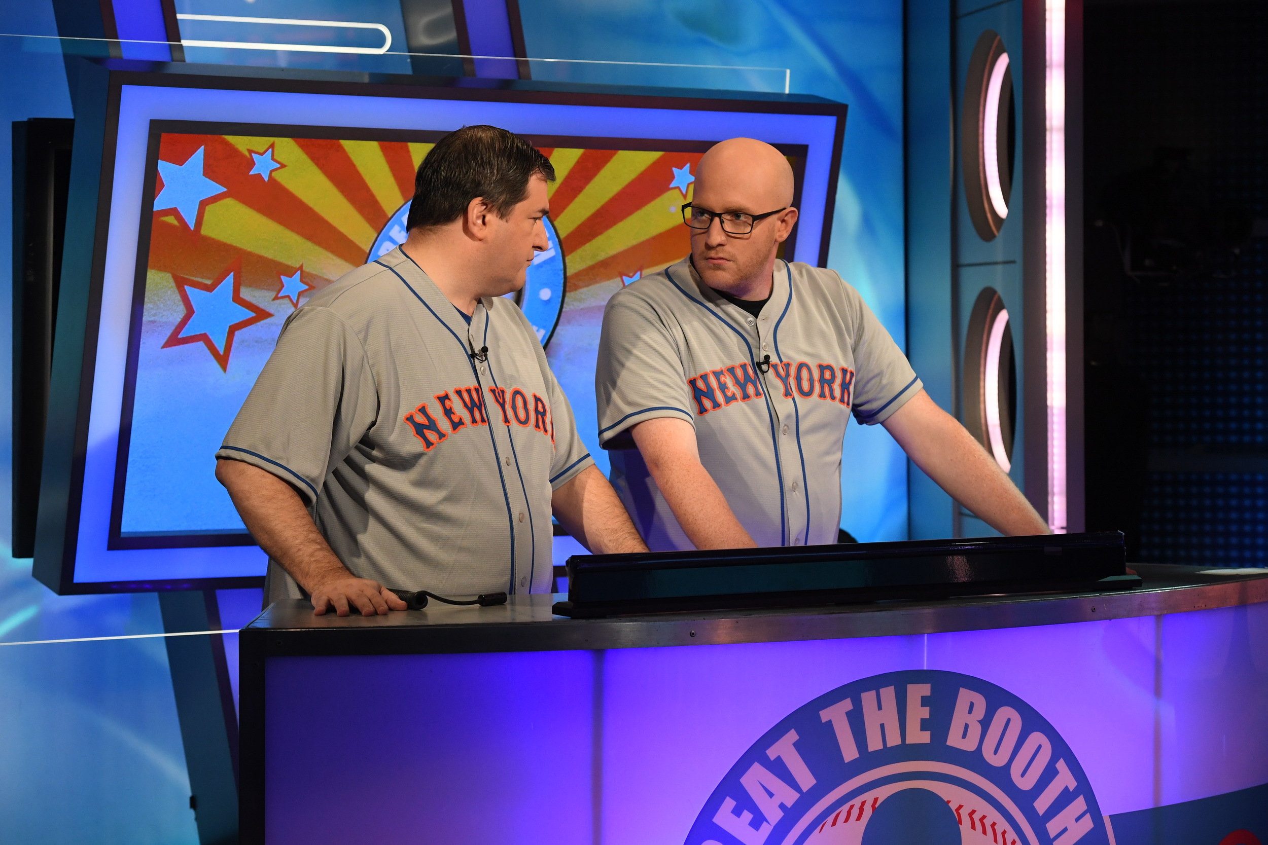 James Hawkins, right, of East Northport, and Andrew Padaetz, of Brooklyn, talk things over on trivia game show “Beat the Booth.”