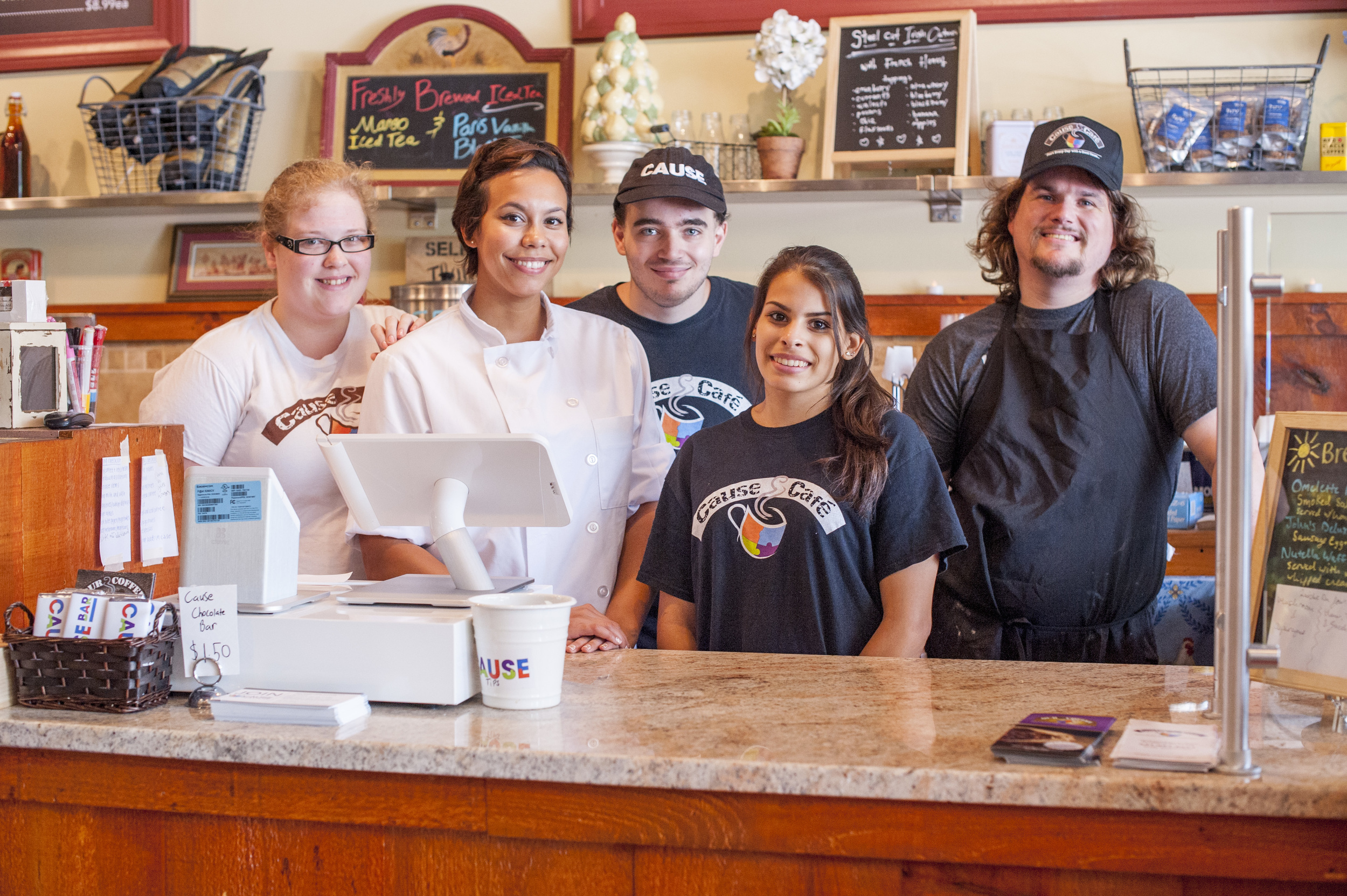 Staff members of the Cause Café in Northport, pictured from left: Sarah Thompson, Chef Felicia Fernandez, William Muller, Randi Topel and Mark Kurtz.