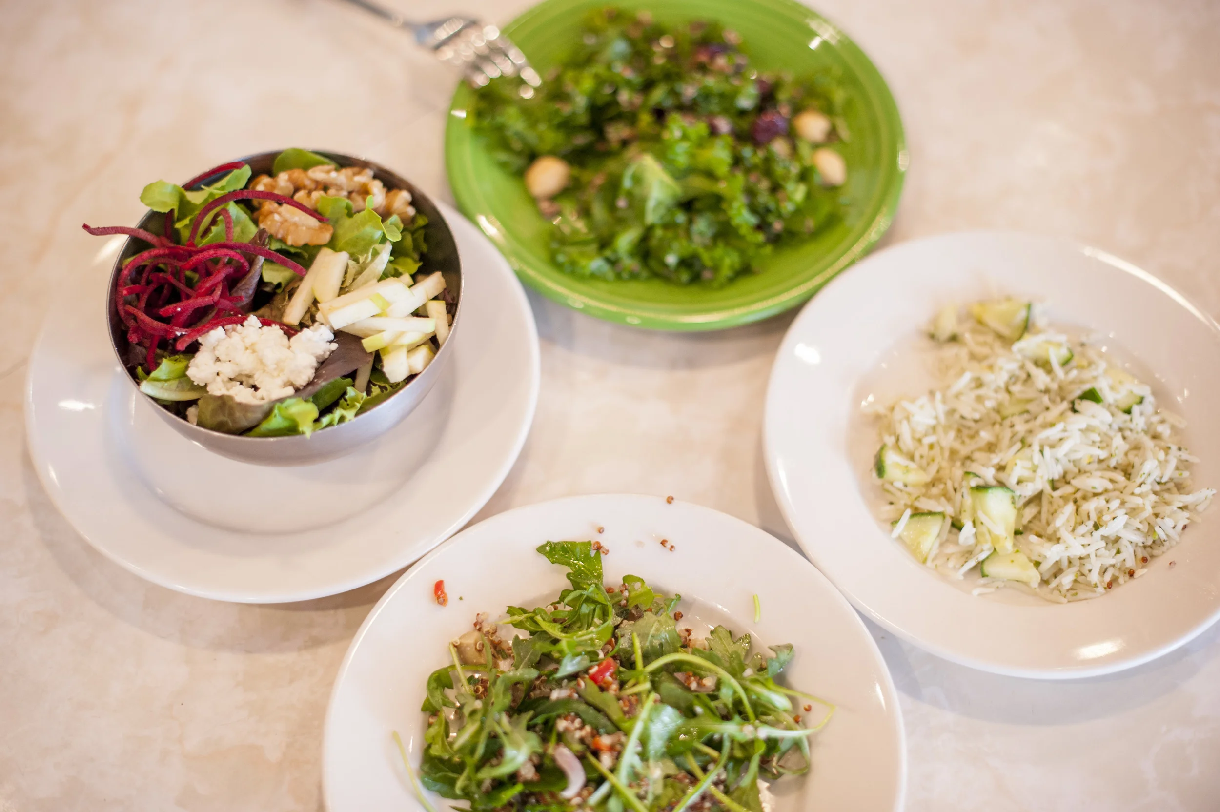 A sampling of the Papillon Butterfly Salad (left), features apples, goat cheese, walnuts, roasted beet and raspberry walnut vinaigrette, is one of the variety of fresh greens sure to add a splash of natural goodness to a meal at Cause Café in Northport.