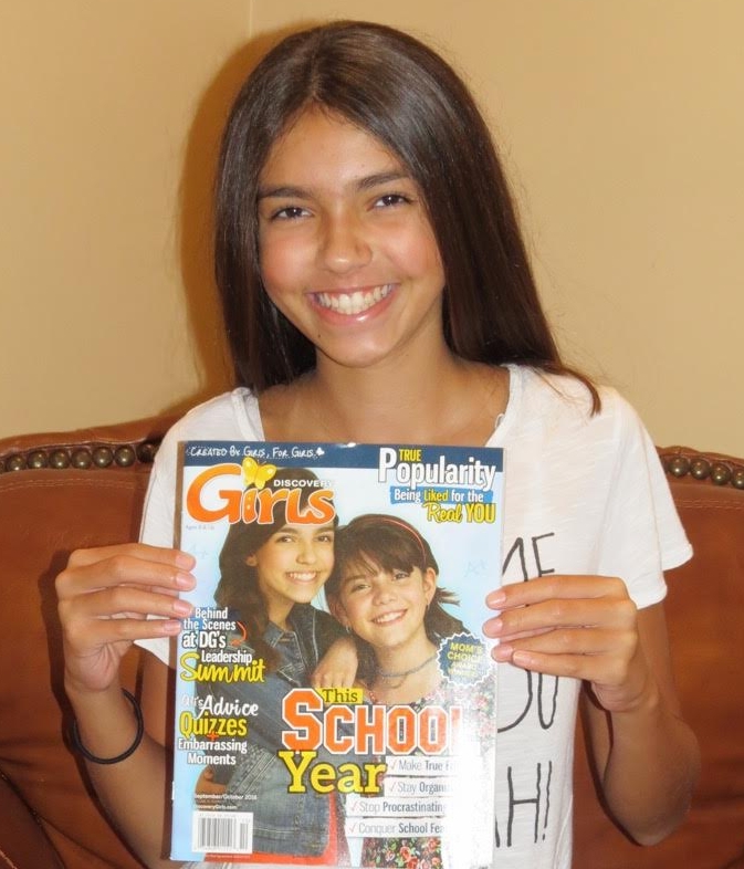 Thirteen-year-old Dix Hills resident Victoria Albanese is featured in the September/October 2016 issue of Discovery Girls Magazine, which she is pictured holding.