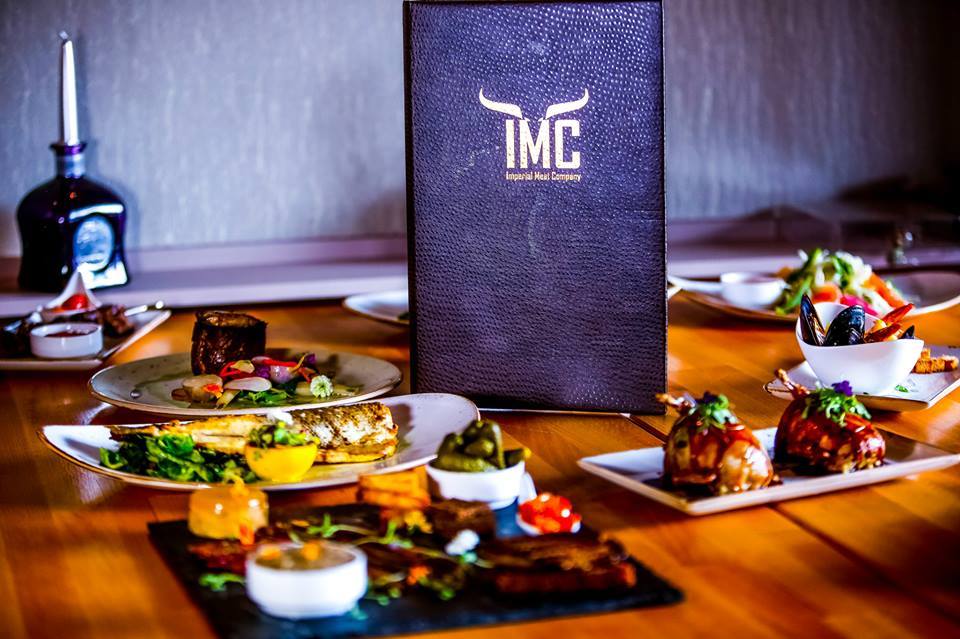 IMC Restaurant & Bar has debuted its new fall menu, which features appetizers like maple glazed bacon and entrées like lamp chops.