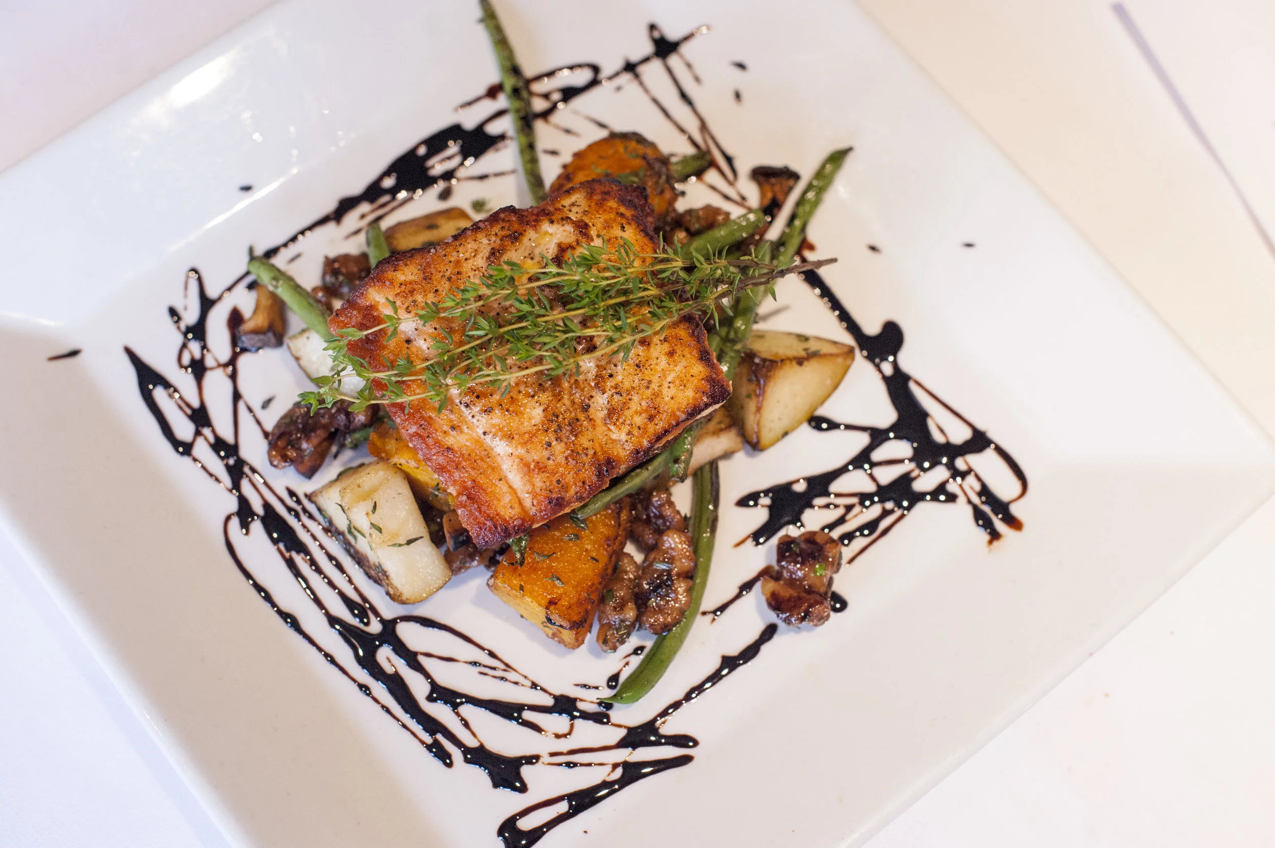The Salmone offers trumpet royale mushrooms, haricot vert, butternut squash, caramelized walnuts and with a drizzle of apple and balsamic reduction.