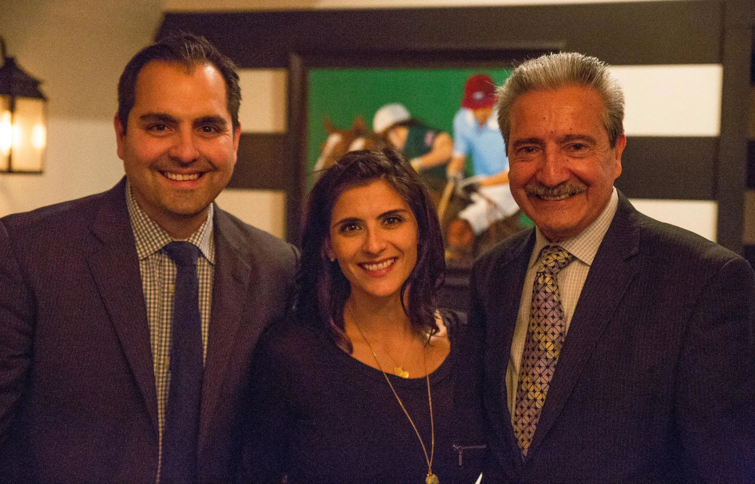 Cafe Buenos Aires owner Hugo Garcia, right, poses with son Gabriel Garcia and daughter Vanessa Long, who help him run the restaurant.