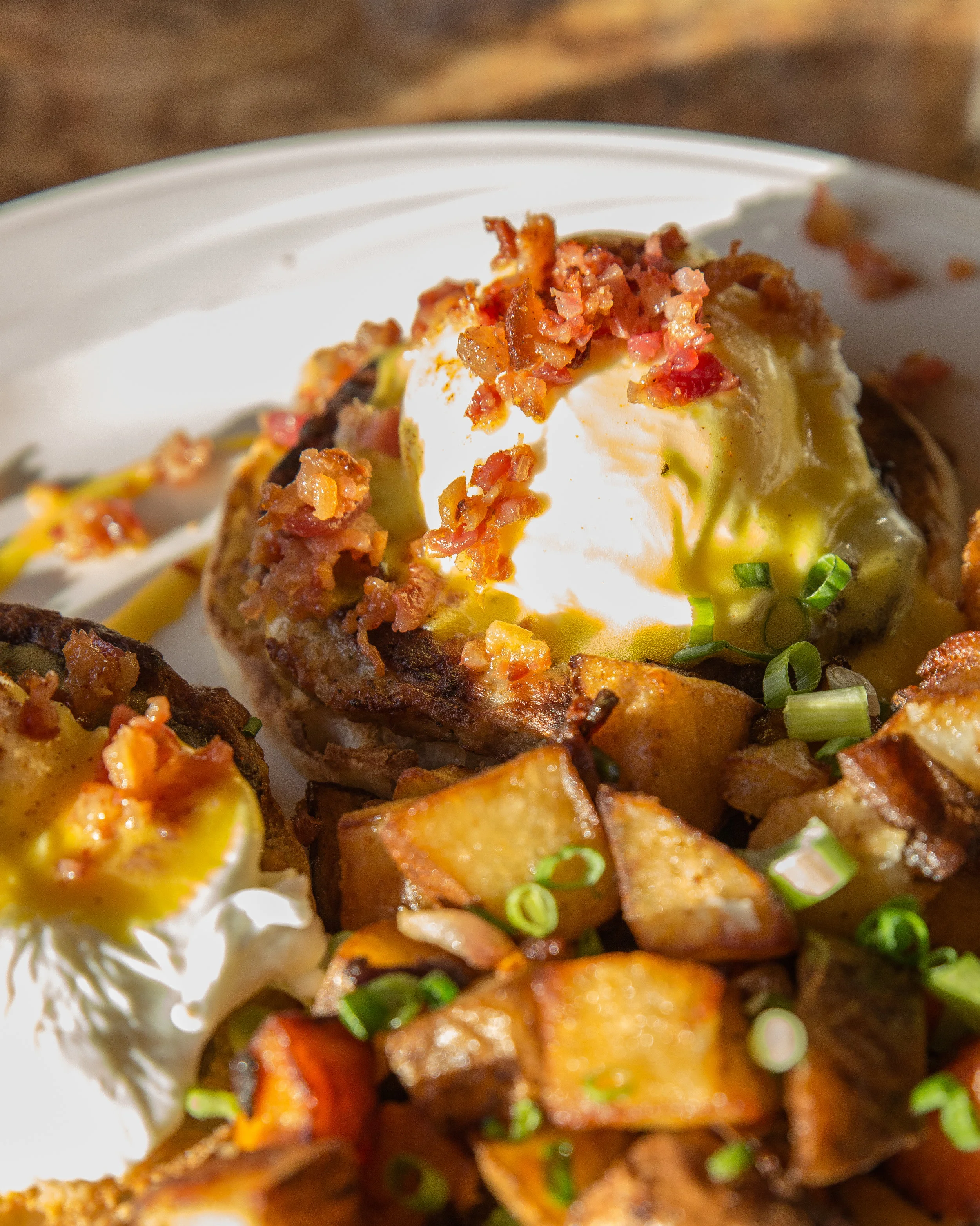 The Chef Benedict, is reminiscent of an open sandwich, serving up two poached eggs over sausage patties and English muffins, topped with Hollandaise and chopped bacon.