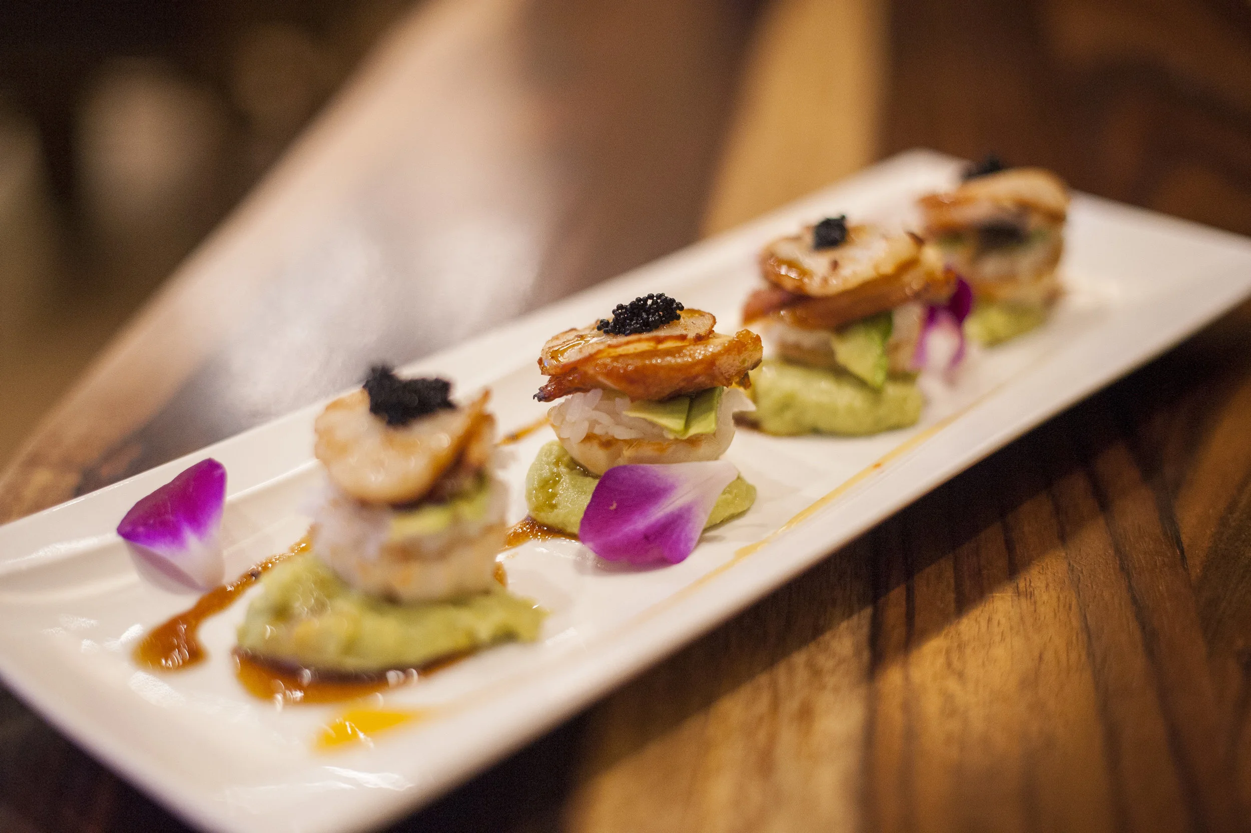 Zaza Japan’s Pan Seared Scallop Sushi comes in the form of four mini fillo shells filled with sushi rice, avocado, layered with eel and pan seared scallop, drizzled with a bit of horseradish sauce.