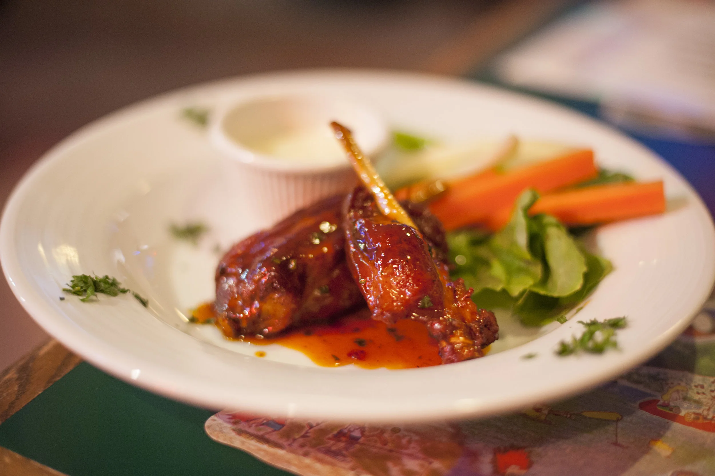 The Fried Pork Dragon Wings at The Shamrock are fried, then sauteed in a dragon sauce that delivers a sweet and tangy spin on traditional wings.