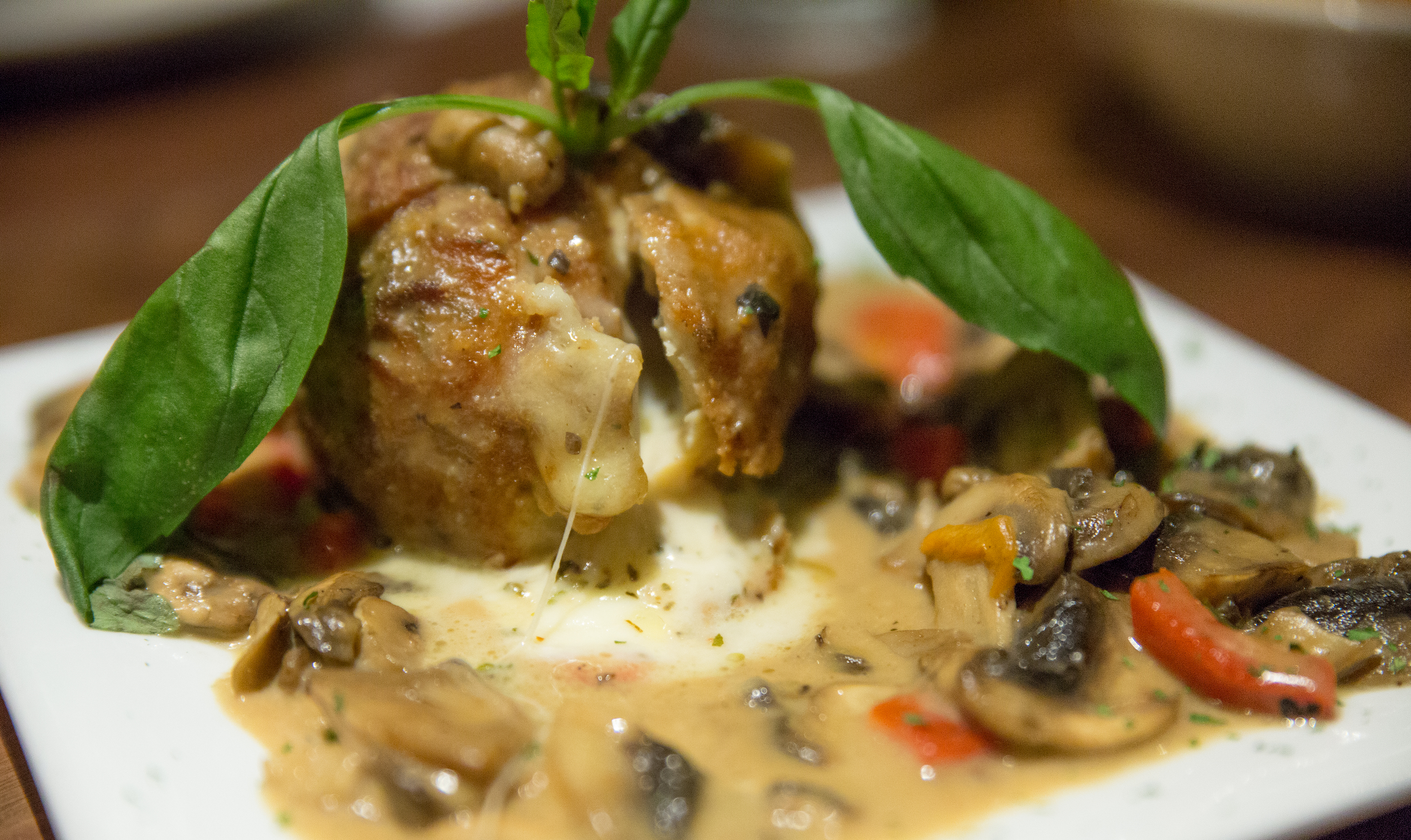 The Pollo Mona Lisa is a specialty at La Scala for good reason, serving up chicken rolled into hollowed meatball, stuffed with prosciutto, provolone and mozzarella cheese, all lightly breaded and fried.