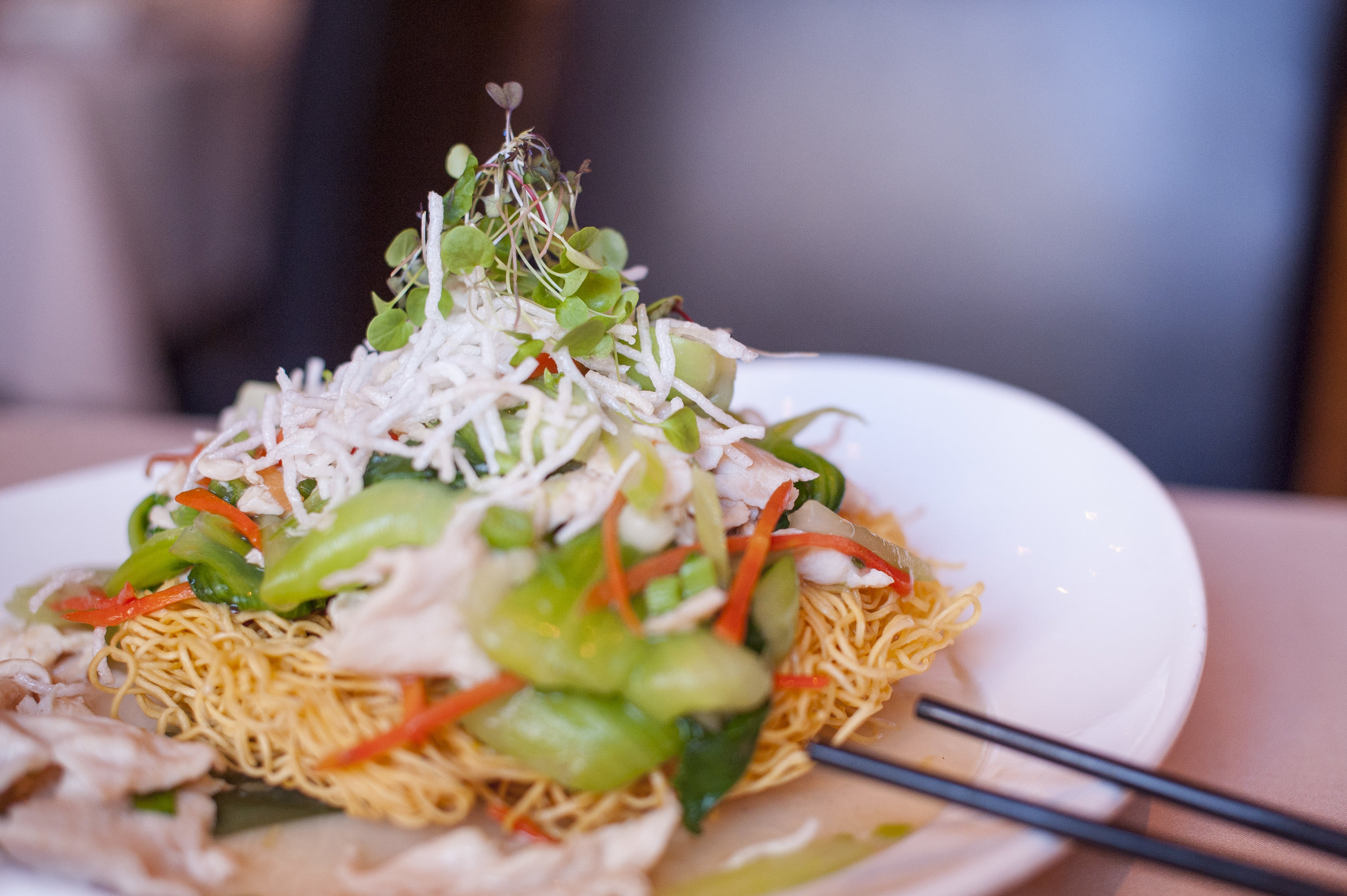  The HK Style Pan Fried Noodles mix up bok choy, celery and carrots. Though a lighter entree, it still boasts hearty flavor and features a choice of chicken, beef or shrimp. 