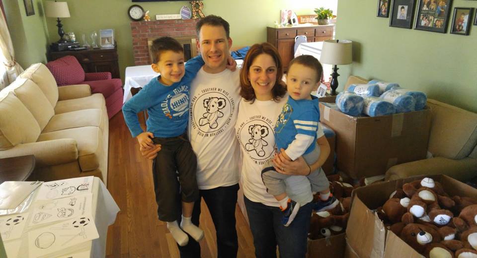  Facebook photos/Rachael Vollaro Risinger  Rachael Risinger, her husband, Scott, and two children, Noah, left, and Lucas, right, are all smiles working on Risinger’s mission to decorate and stuff Sweet Cases for Suffolk County foster children in nee