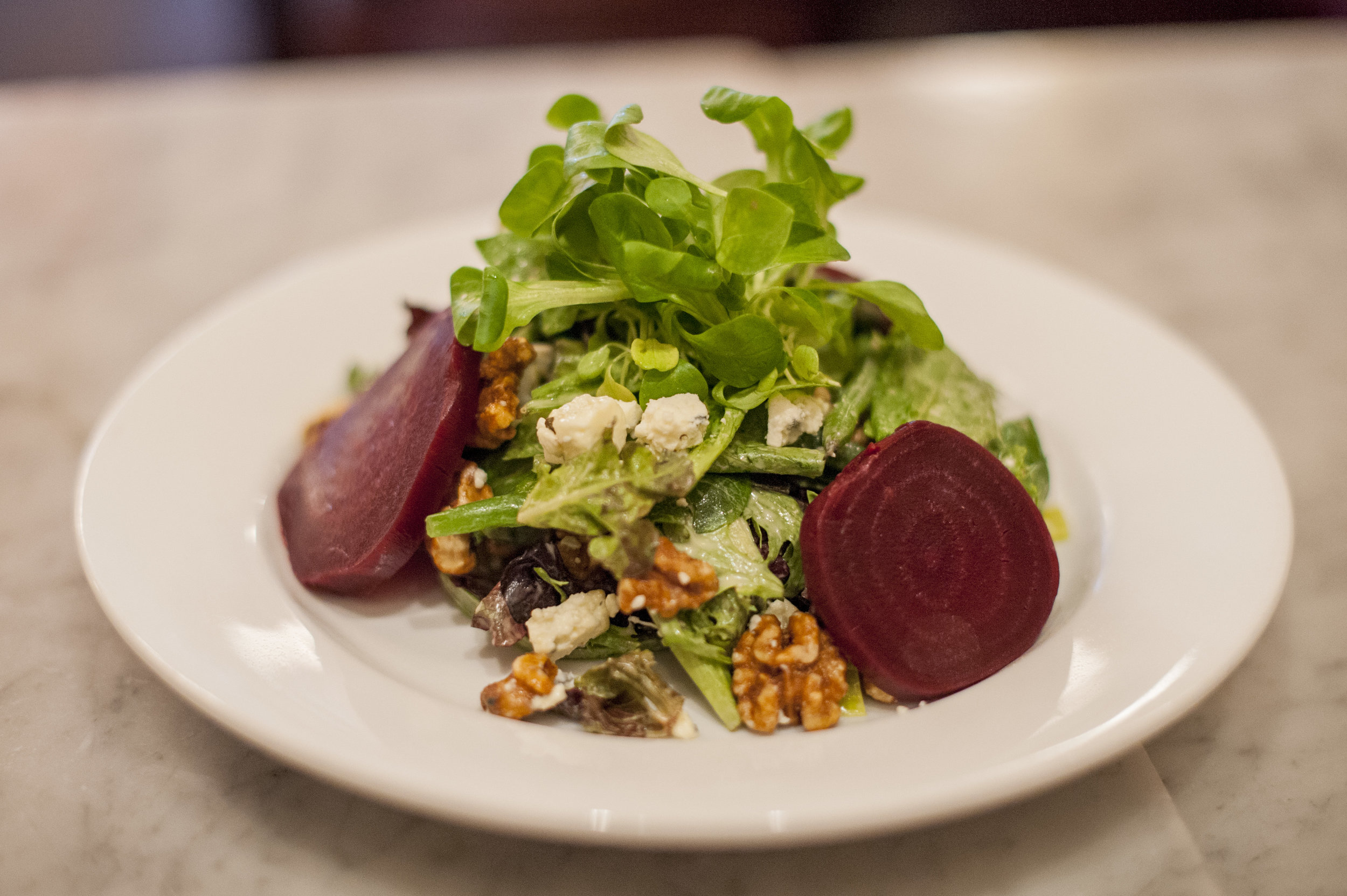  Long Islander News photos/Jano Tantongco The Salade Cassis features microgreens, Roquefort cheese, roasted beets, walnuts, French beans, poached leeks and dijon vinaigrette, creating a mix of bold and fresh flavors. 
