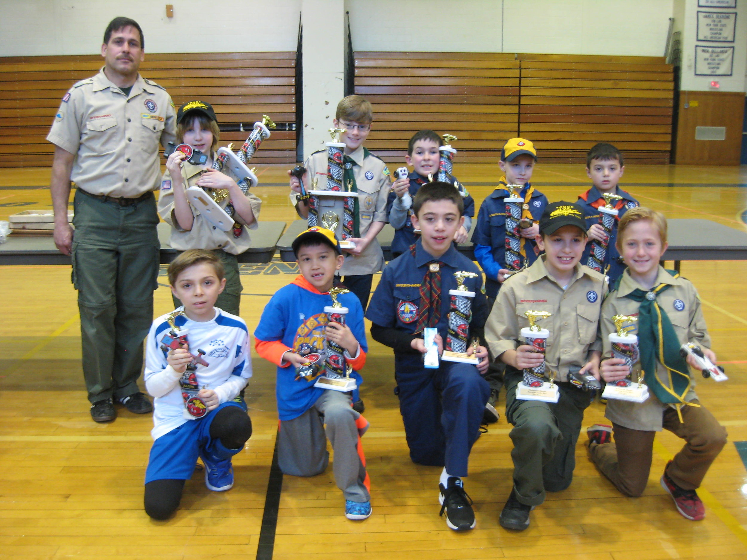  Top district winners, from right, were: (front row) Gregory M, 1st place, ofPack 329, Commack; Aidan L., 2nd place, ofPack 52, East Northport; Mario M., 3rd place, ofPack 5, Northport; Jack R., 4th place, ofPack225, Greenlawn; and, standing in for 5