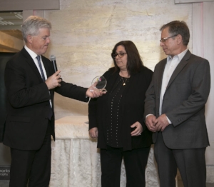 Suffolk Executive Steve Bellone awards the first annual Scott Martella Alumni Award to Scott’s parents, Stacy and Stephen Martella.