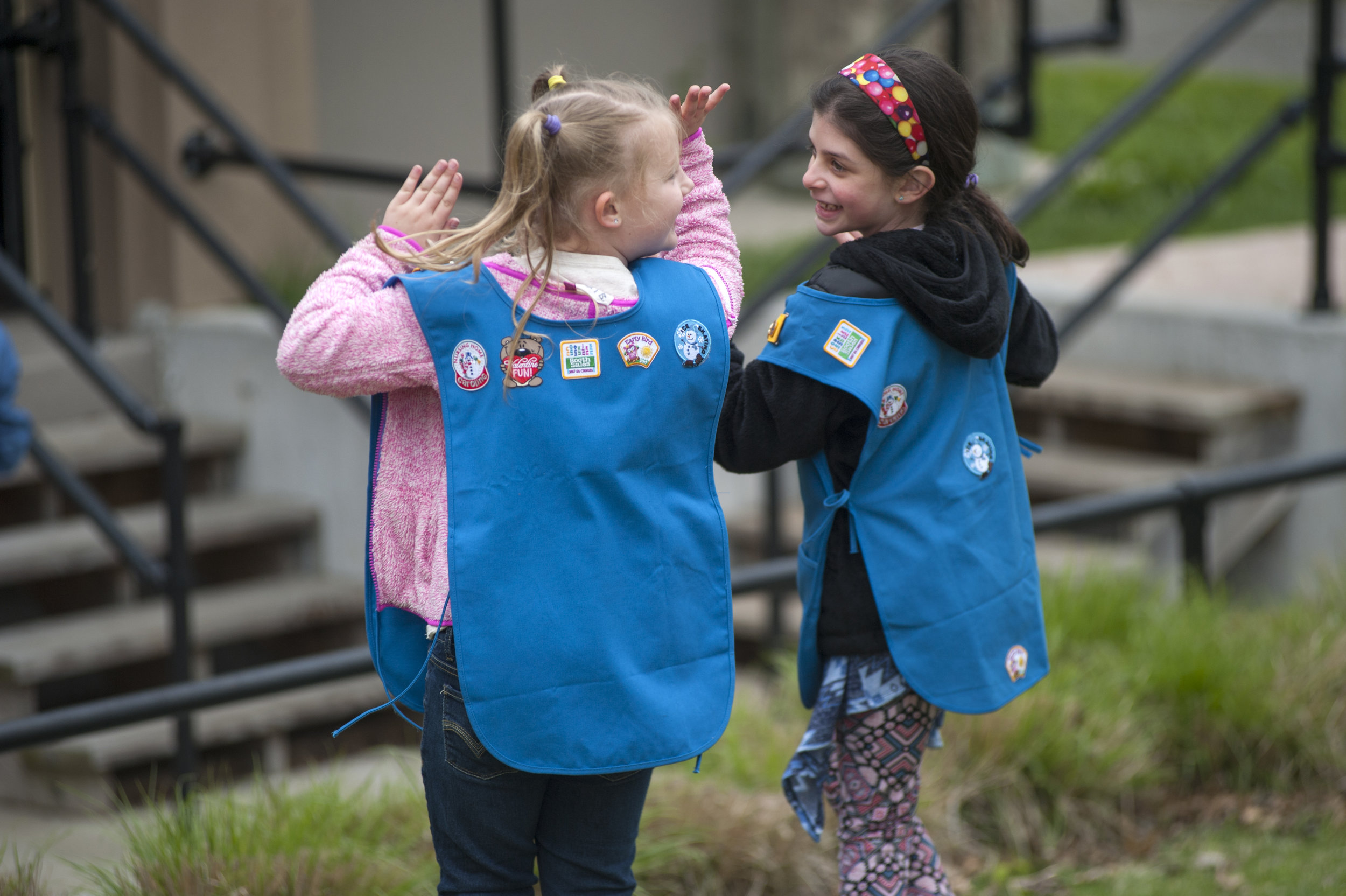  Two Girl Scouts copy the dance moves of Mike Soloway, a children’s musician. Soloway and his band were one of the three performances who played the Chapin Rainbow Stage at the Tulip Festival, along with guitar ensemble Inkarayku and puppeteer Janice