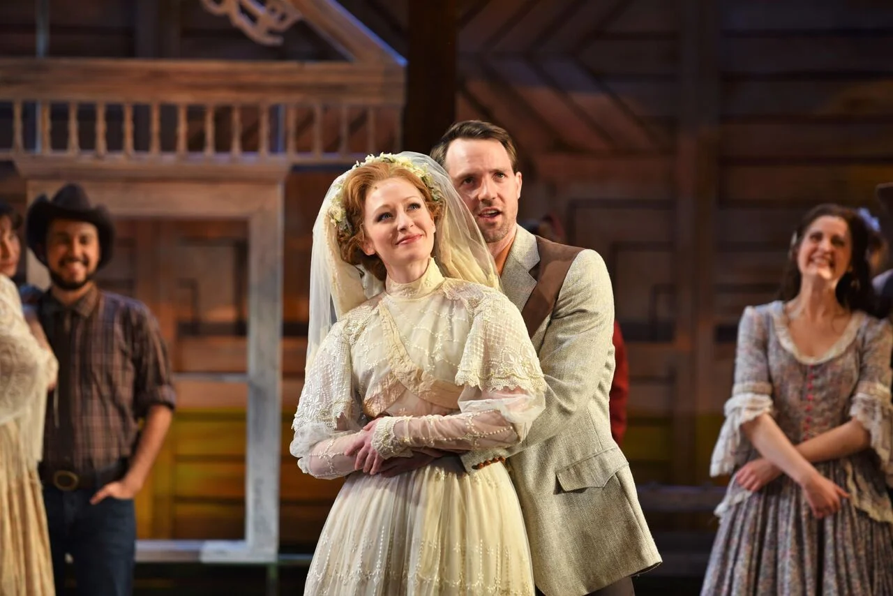  Kaitlyn Davidson, as Laurey, and Bryant Martin, as Curly, deliver strong chemistry on stage in the John W. Engeman Theater’s production of “Oklahoma!” 