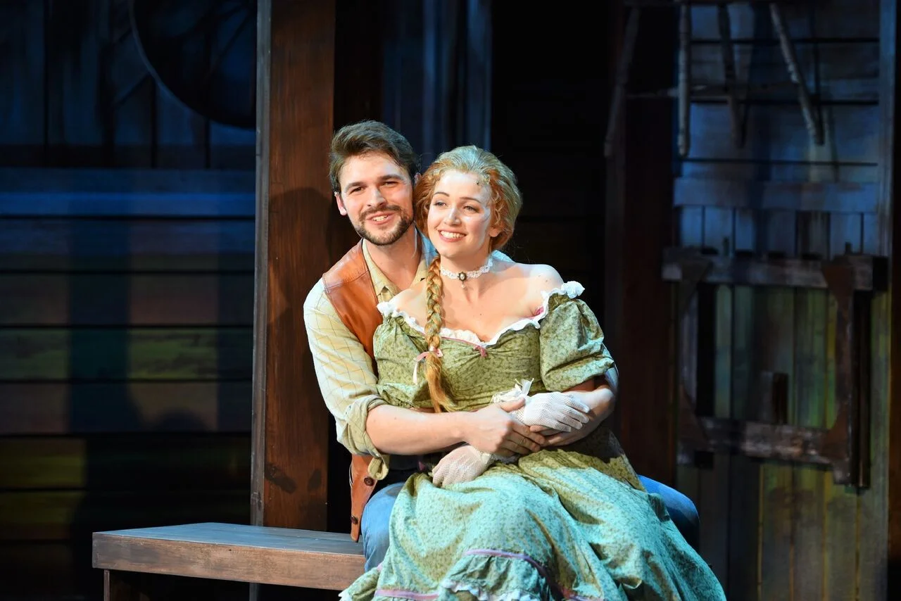 Chris Brand, as Will Parker, and Brianne Kennedy, as Ado Annie, offset the intensity in the story of “Oklahoma!” by delivering comic relief for audience members of the John W. Engeman Theater.    