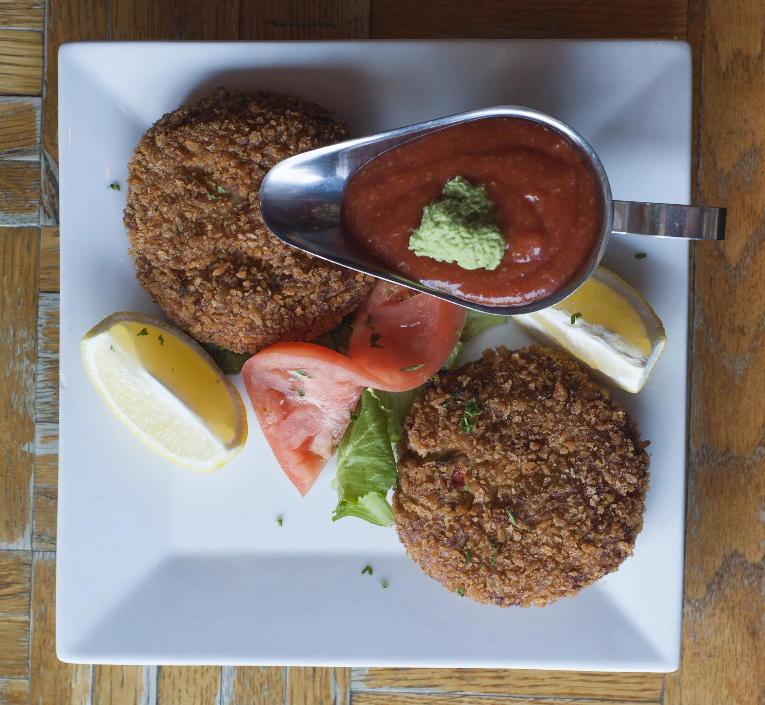  The oversized Crab Cakes were fantastically fluffy and crispy on the outside, served with a tangy cocktail sauce served with a dollop of wasabi. 