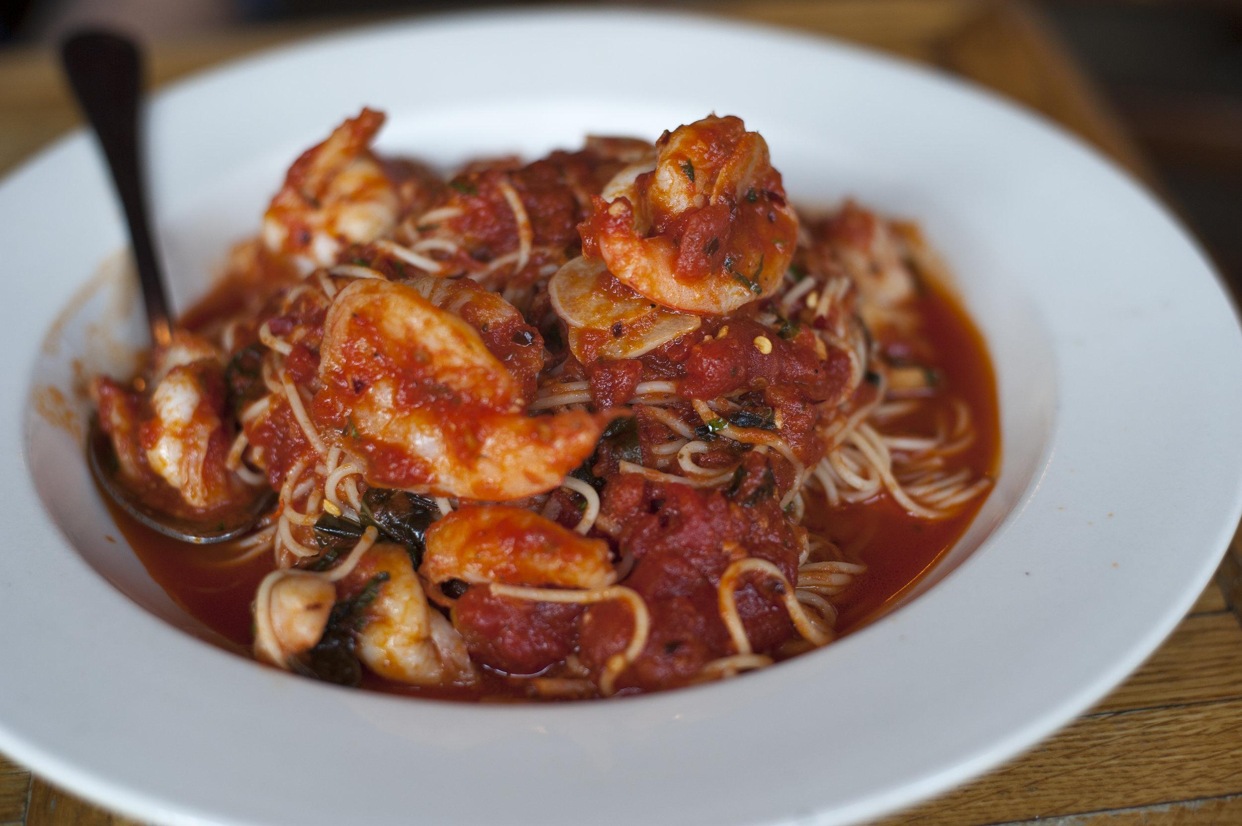  The Shrimp Fra Diavolo features a silky smooth angel hair pasta with perfectly cooked shrimp for a pasta entree to remember, steeped in a generous helping of slightly spicy marinara sauce. 