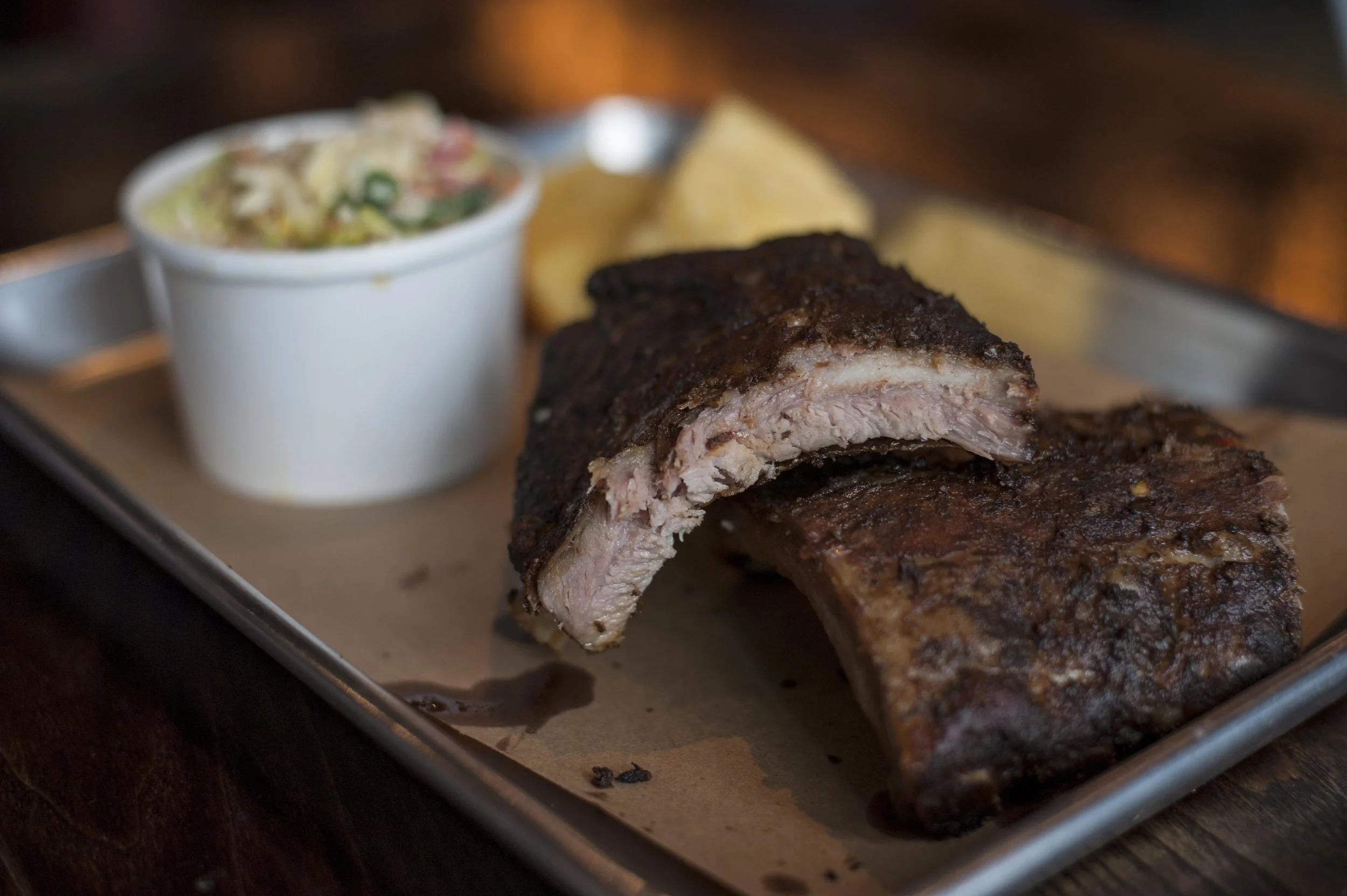  The Straight Up ‘Que featuring Duroc Baby Back Ribs is served with cornbread that’s baked in-house. 