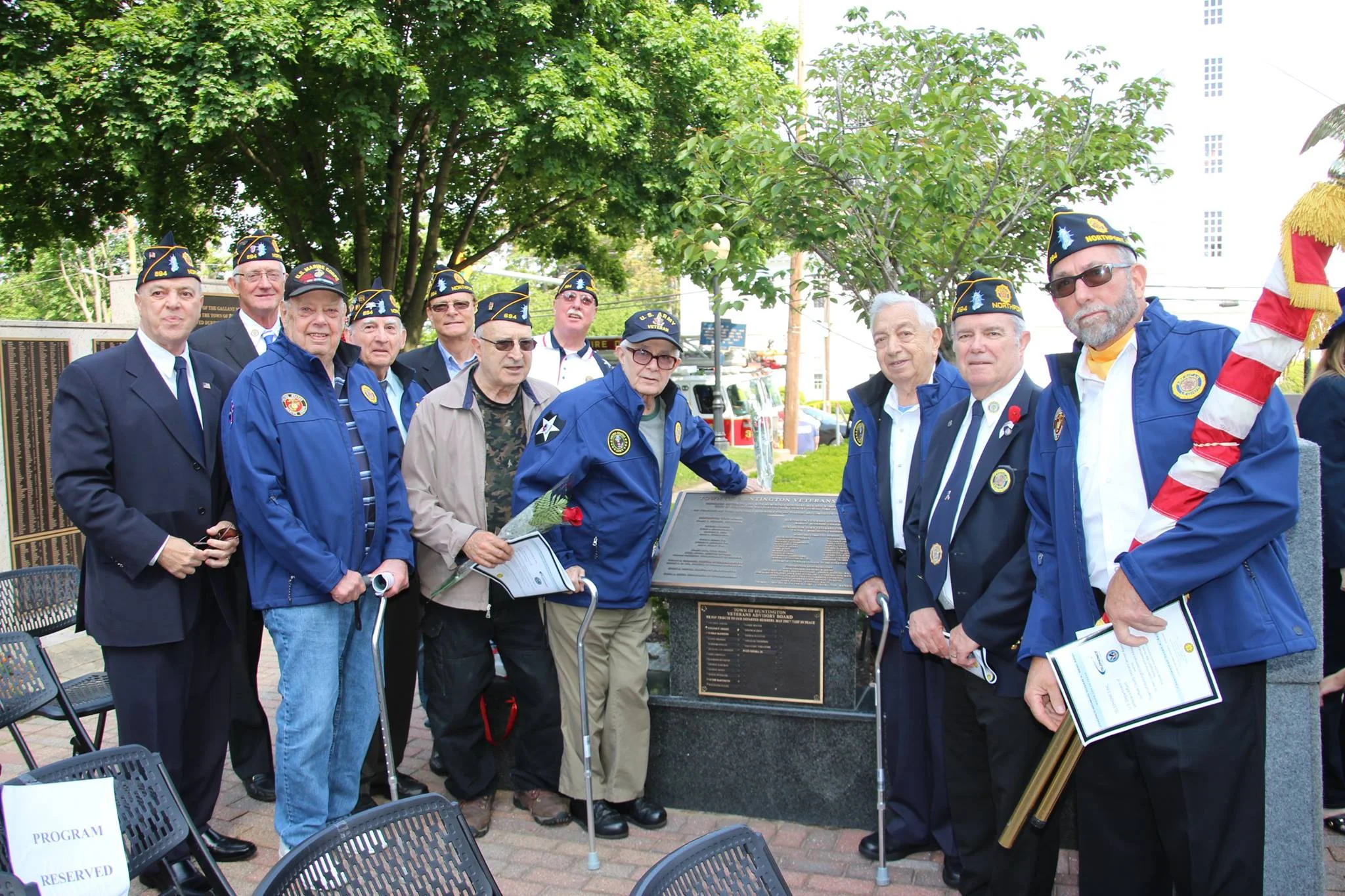  Veterans of Northport American Legion Post 694 are pictured with the town’s memorial plaque for late members of the Veterans Advisory Board. 