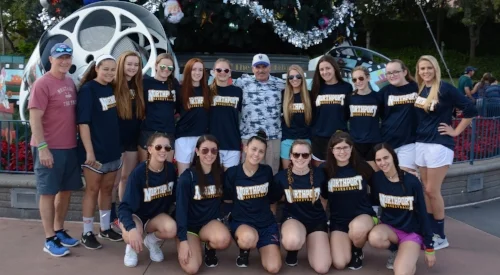 Photos/Northport-East Northport School District Coach Richard Castellano, center, is pictured with members of his Northport High School varsity girls basketball team.