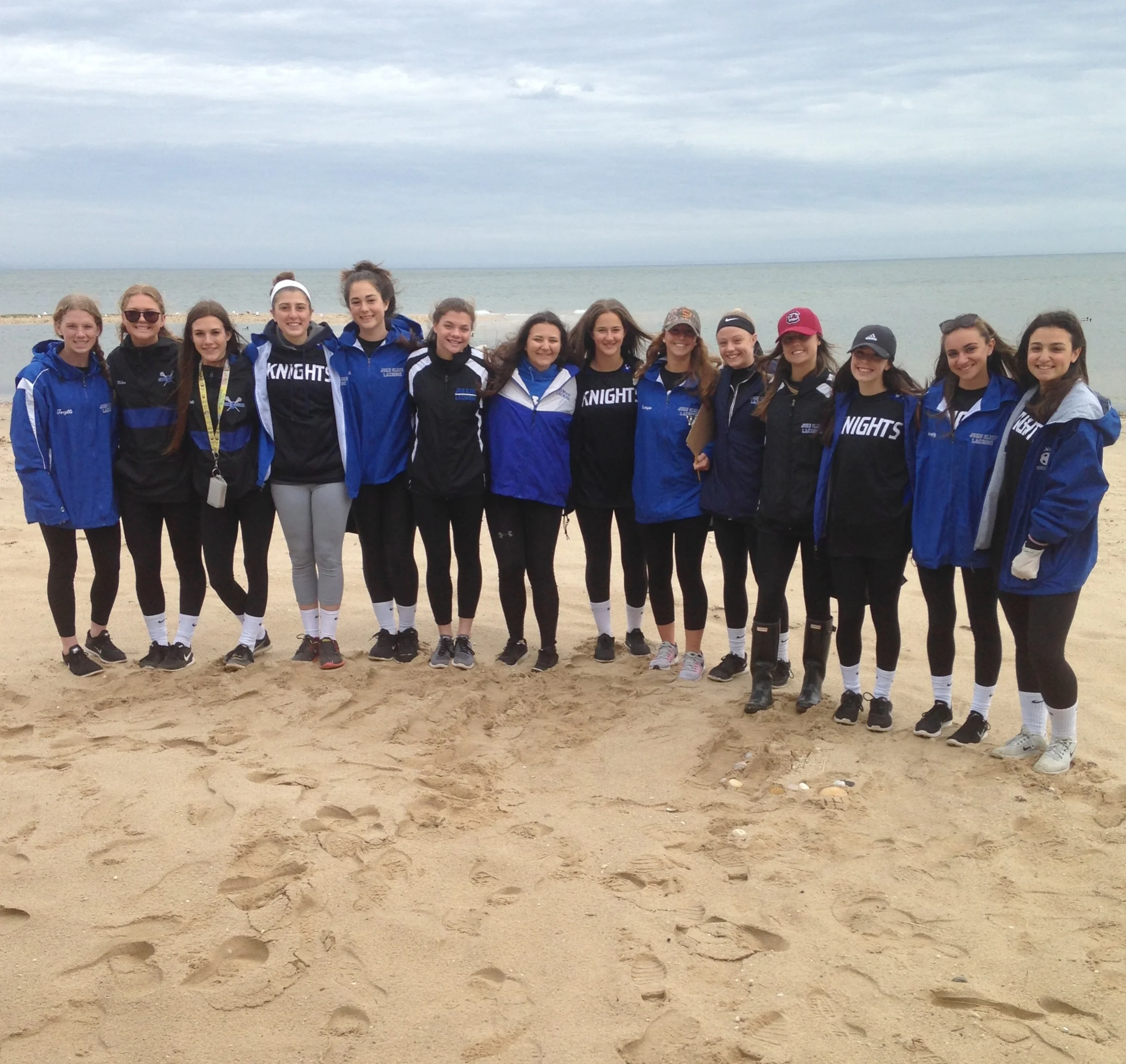 Lady Knights Help Clean Up Beach